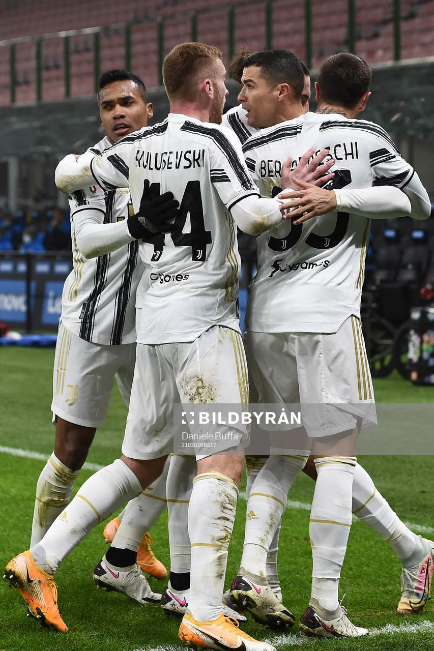 Cristiano Ronaldo celebrate with Dejan Kulusevski of Juventus and teammates during the Coppa Italia Semifinal football match on February 2, 2021 in Milano .