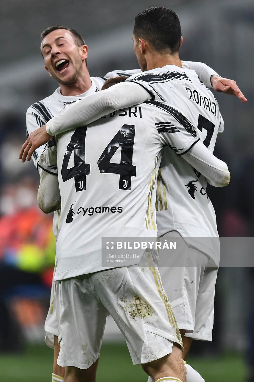 Cristiano Ronaldo celebrate with Dejan Kulusevski of