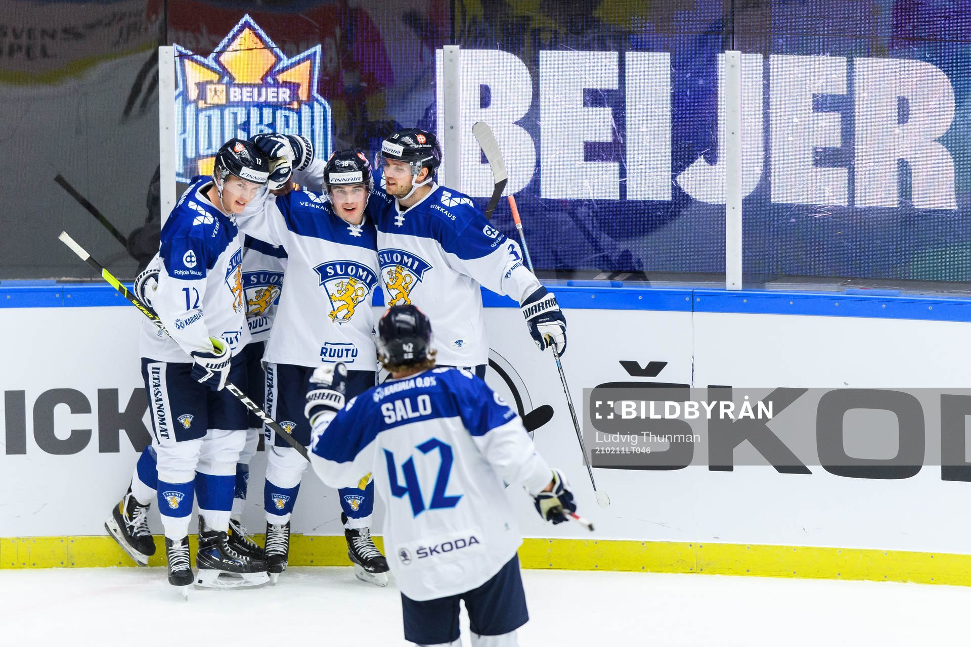 Jere Innala of Finland celebrate with teammates