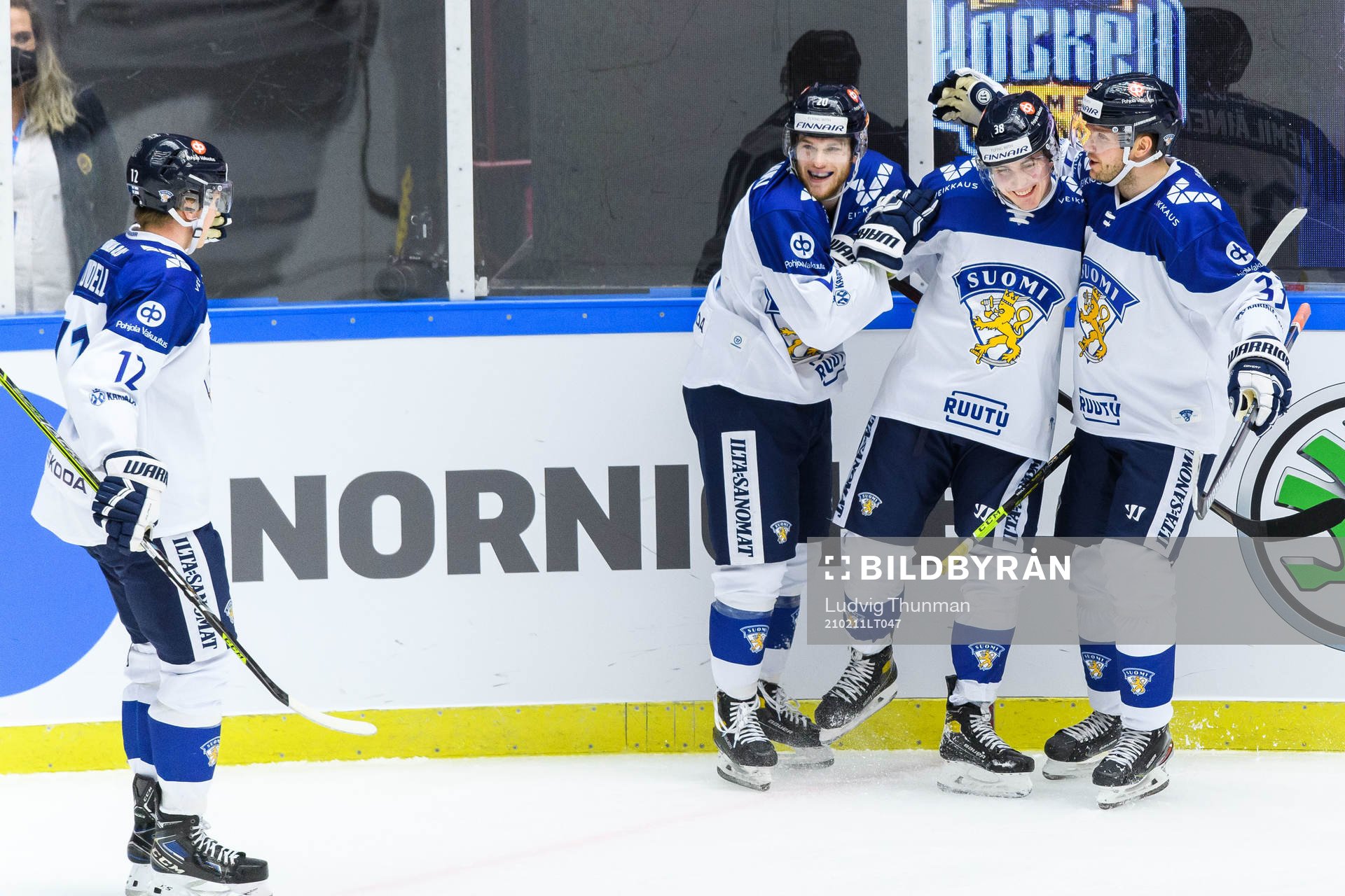Jere Innala of Finland celebrate with teammates