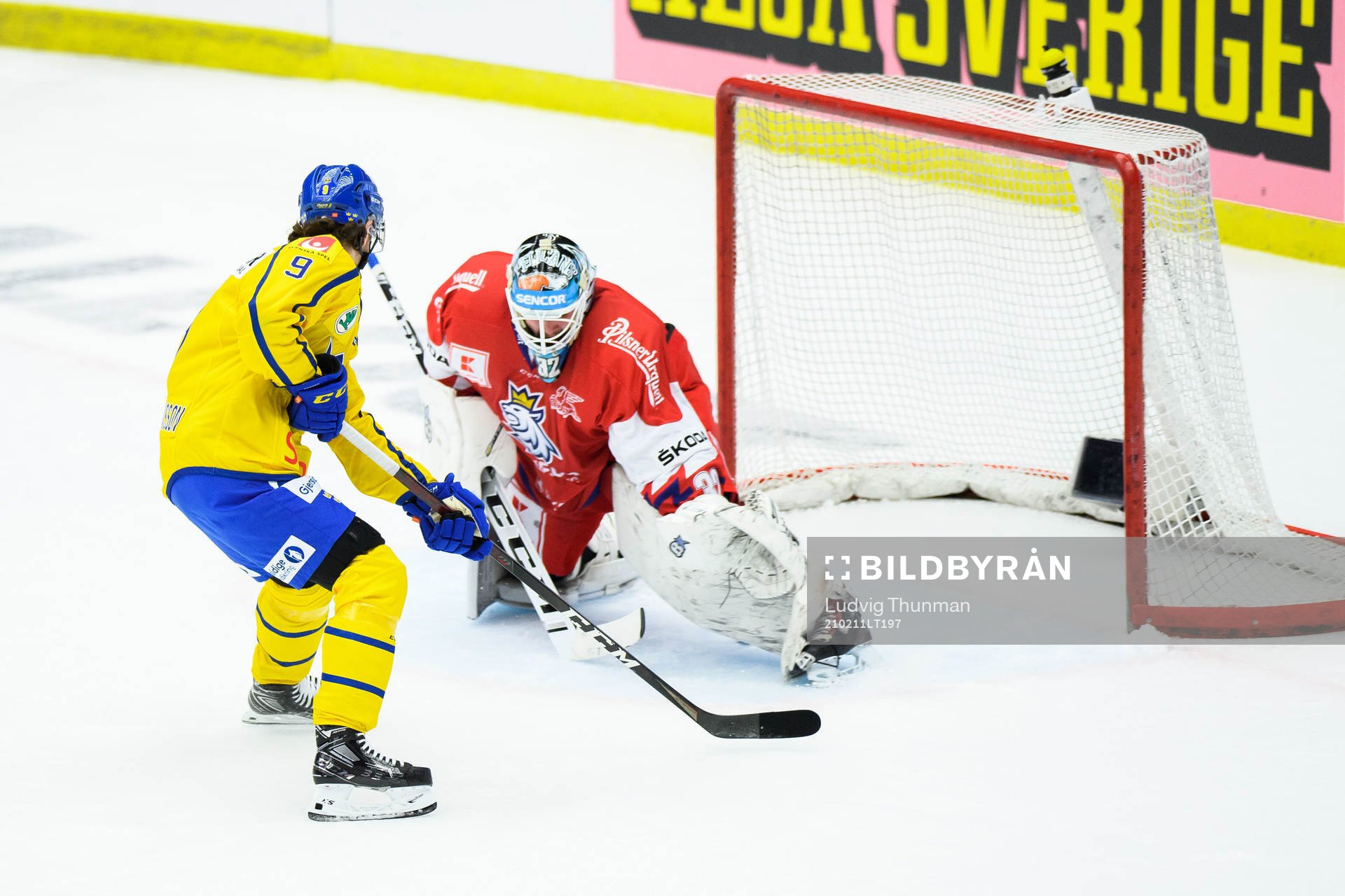 Albert Johansson of Sweden scores the 2-3 goal behind