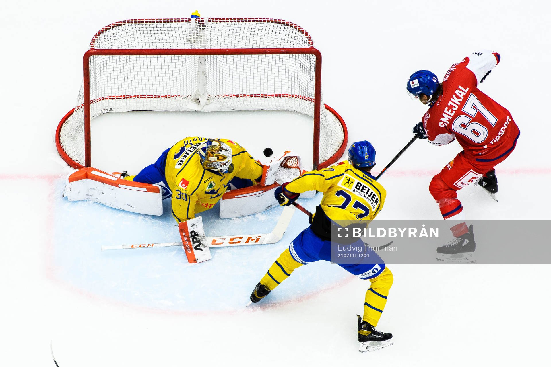 Jiri Smejkal of Czech Republic scores 1-0 behind goalkeeper