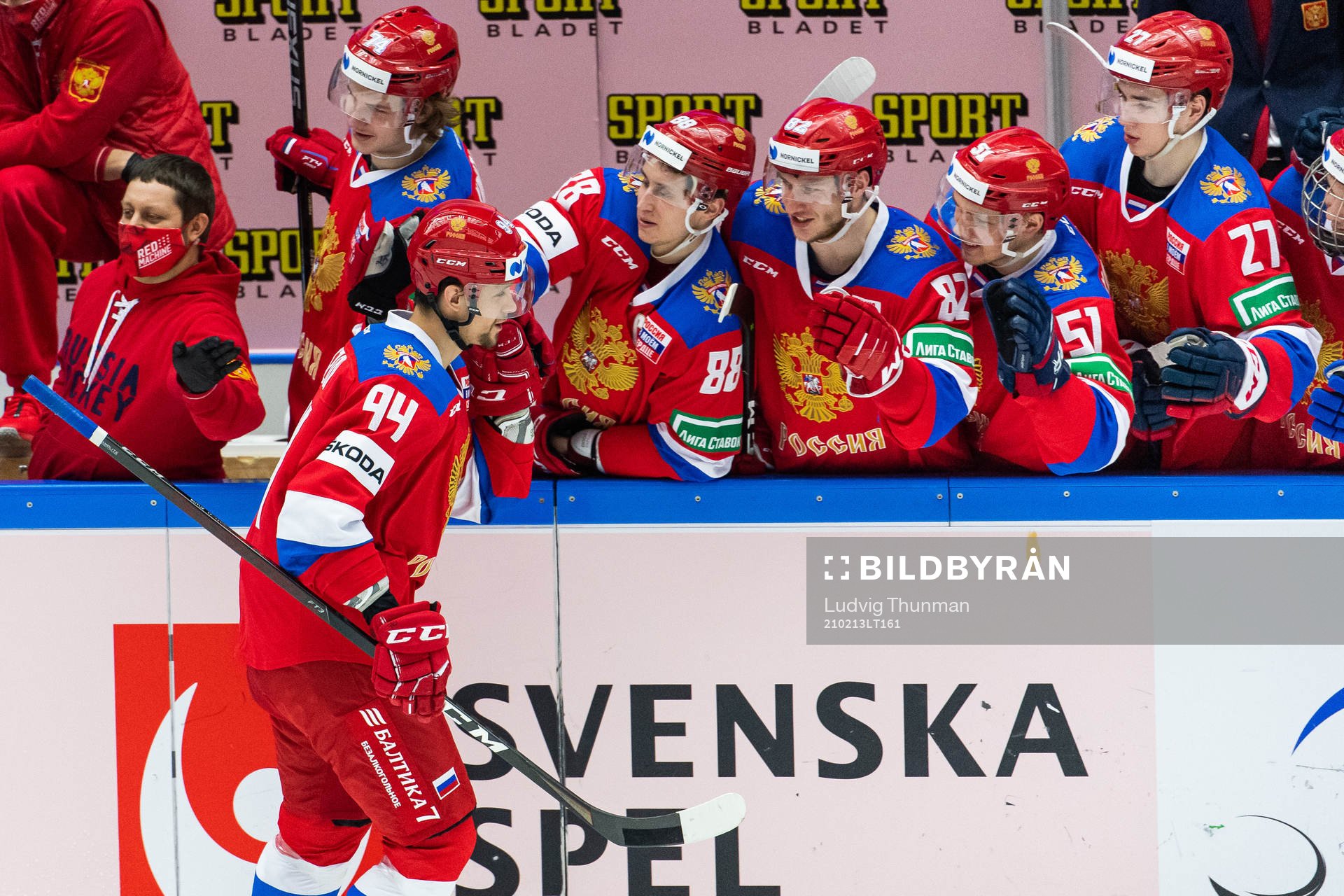 Vladimir Butuzov of Russia celebrates with team mates