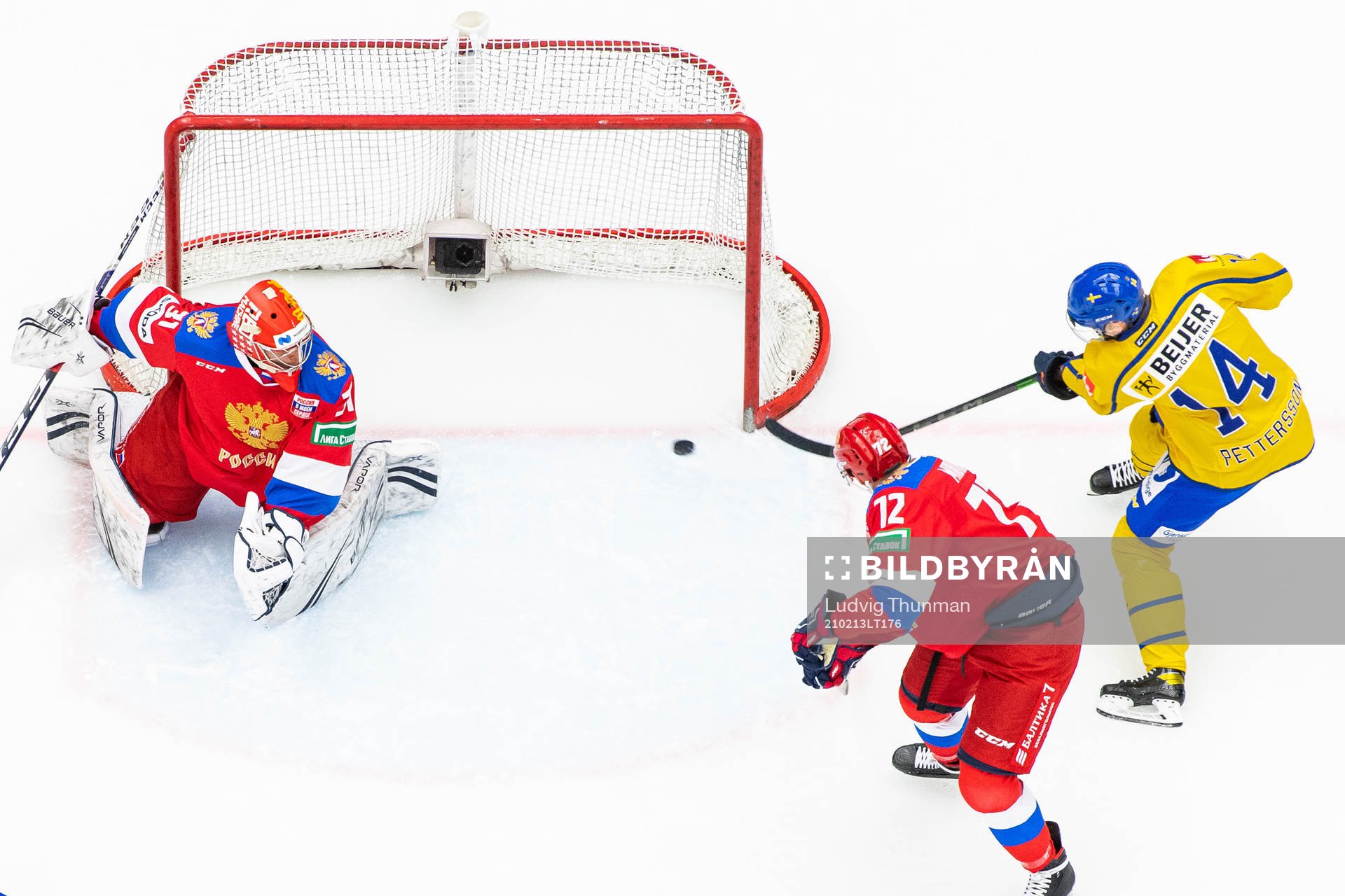 Emil Pettersson of Sweden scores 1-0 behind goalkeeper