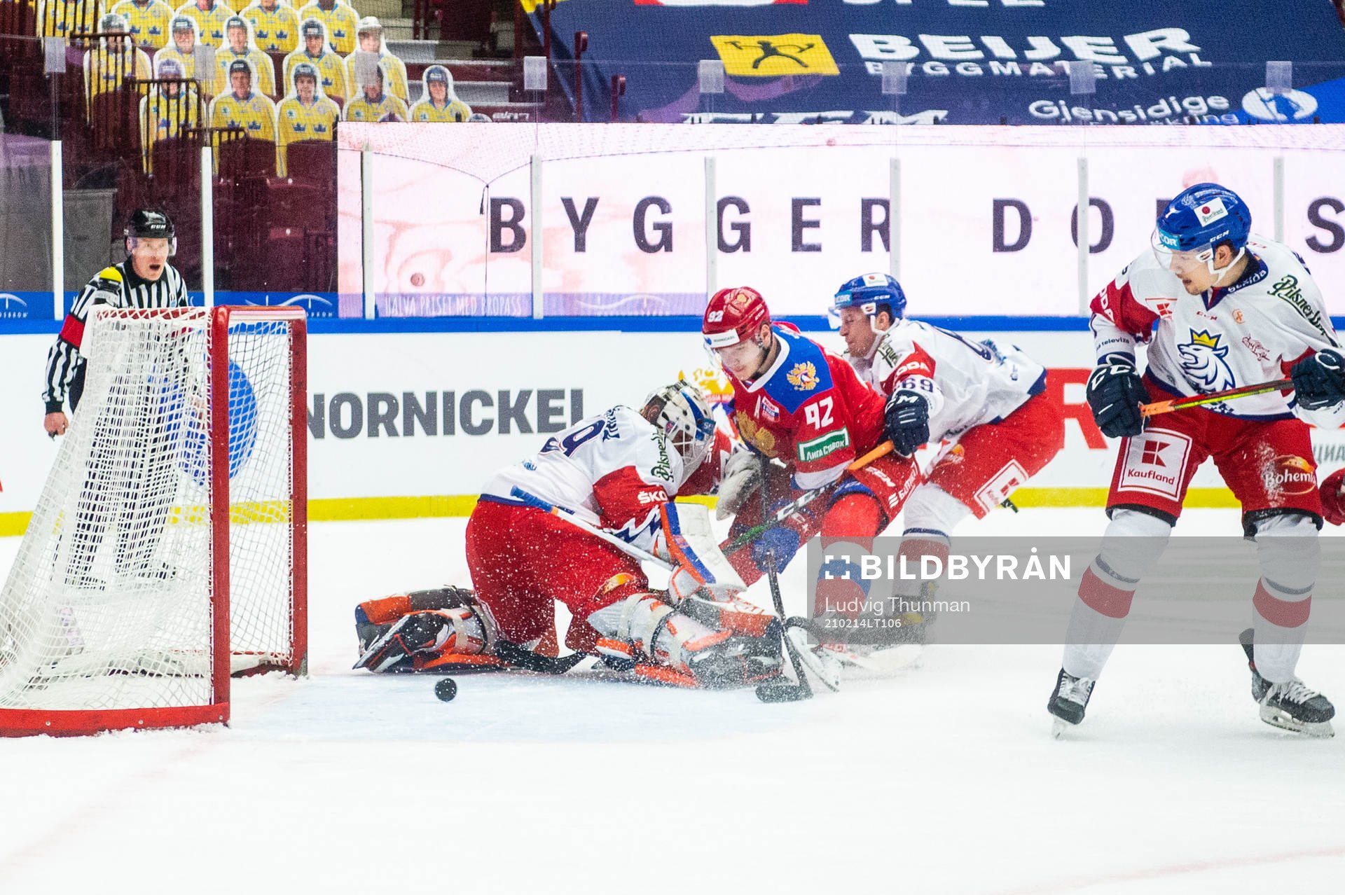 Vasily Podkolzin of Russia scores behind goalkeeper Dominik