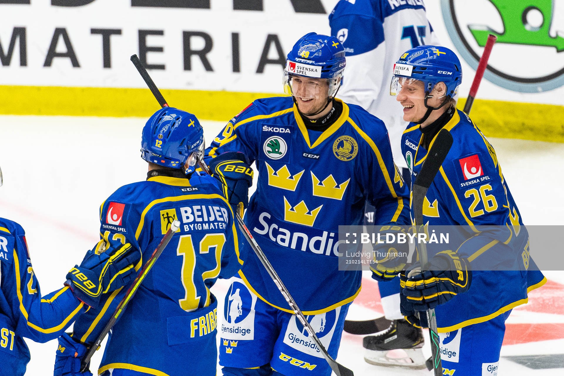 Filip Hållander of Sweden celebrates with Max Friberg and