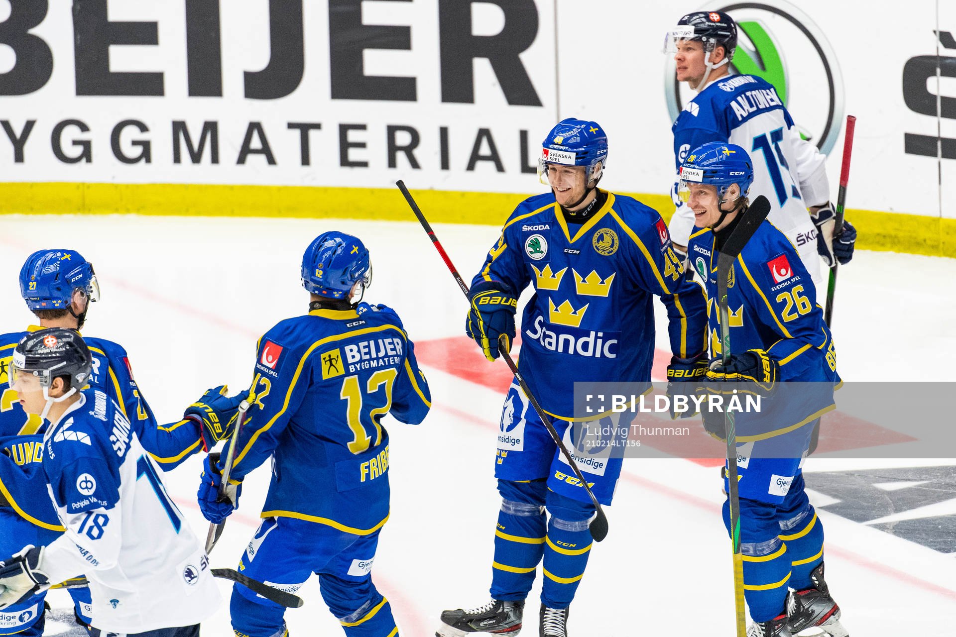 Filip Hållander of Sweden celebrates with Max Friberg and