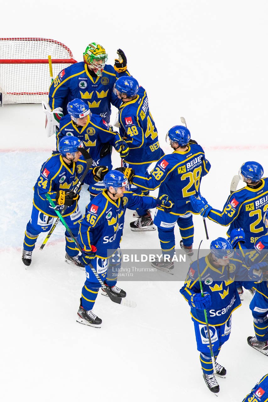 Jonatan Berggren and goalkeeper Christoffer Rifalk of