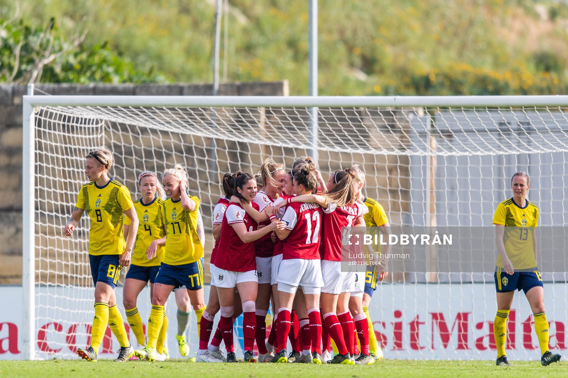 Lina Hurtig of Sweden looks dejected while players of