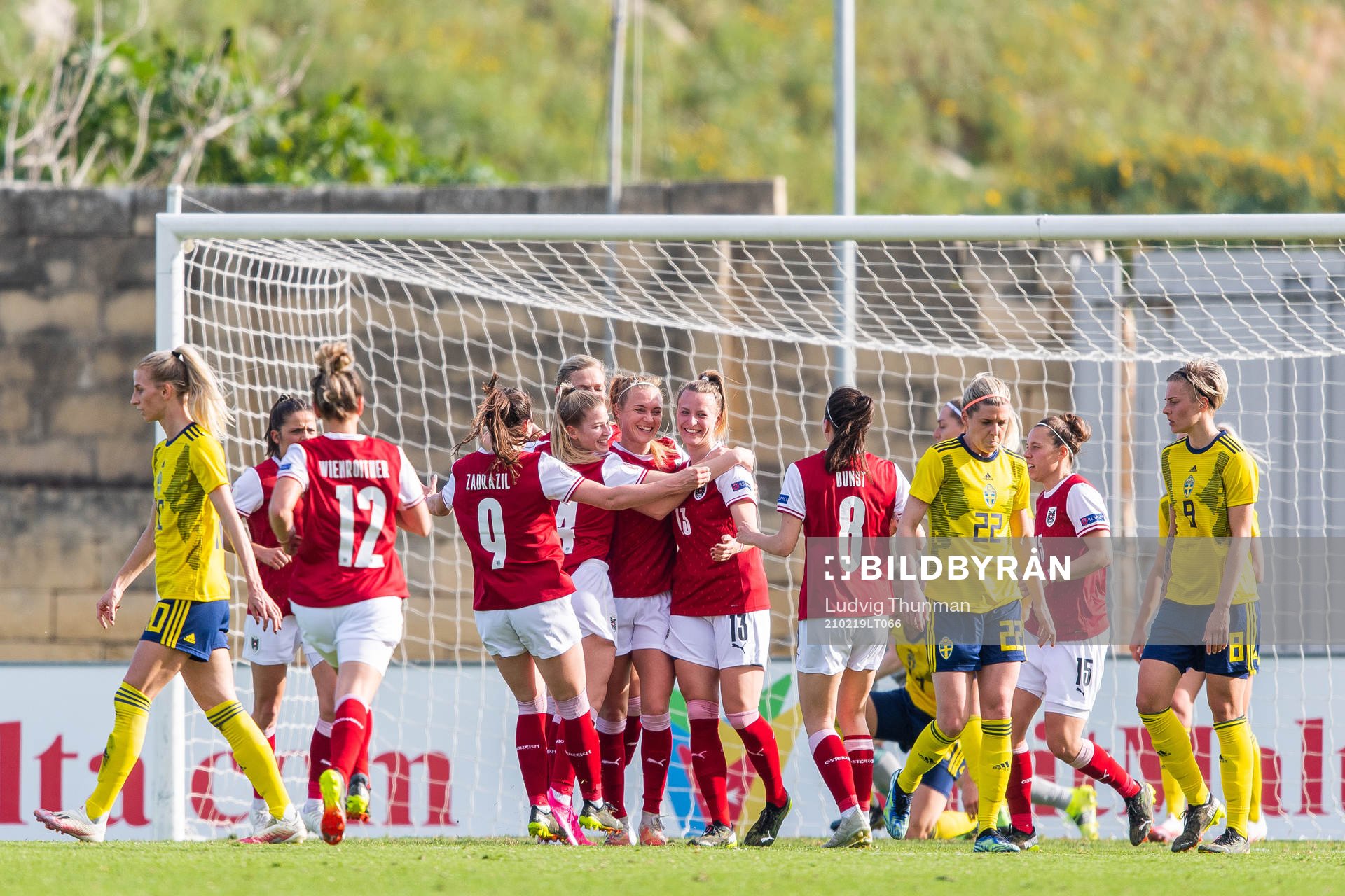 Virginia Kirchberger of Austria celebrates with team mates