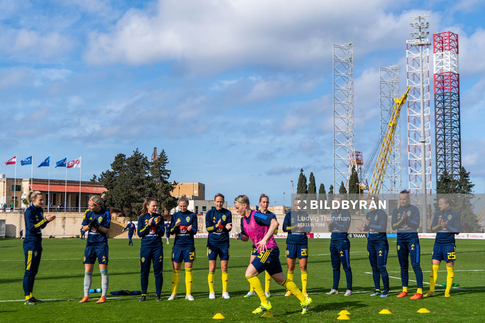 Nilla Fischer of Sweden warm up in front of team mates