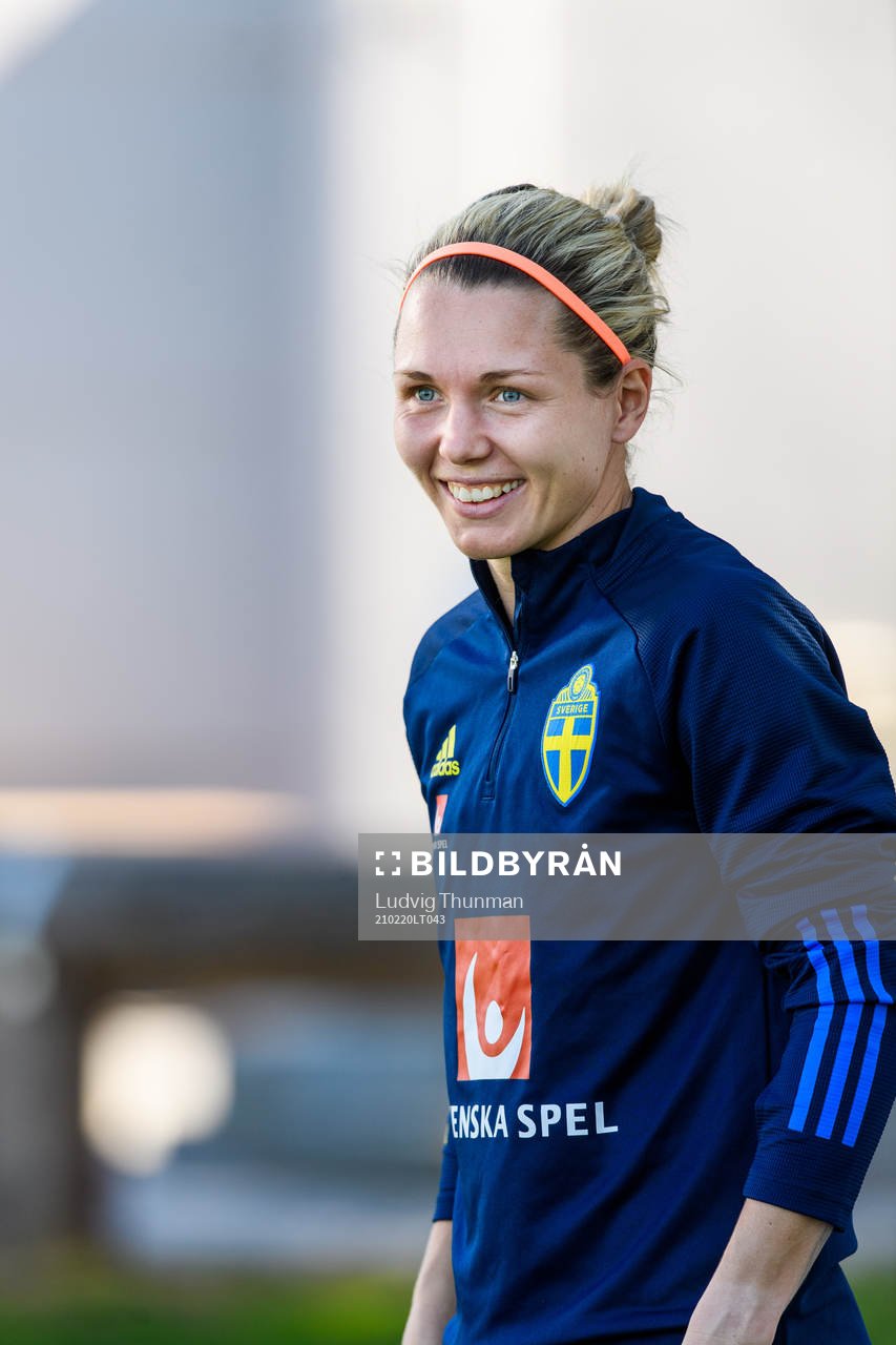 Goalkeeper Jennifer Falk is interviewed by the media