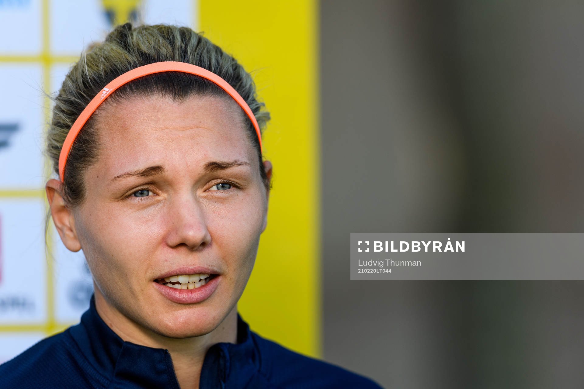 Goalkeeper Jennifer Falk is interviewed by the media