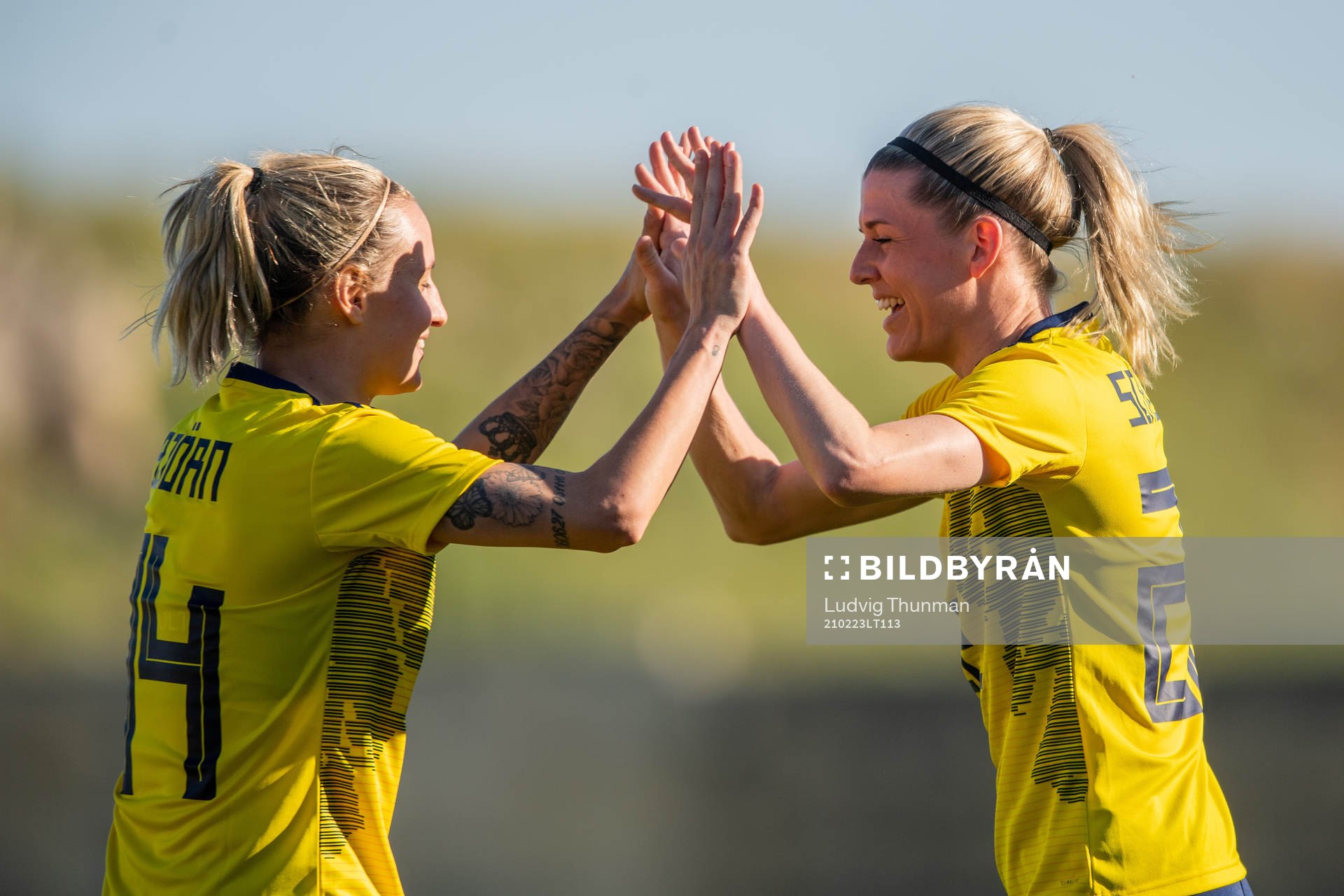 Nathalie Björn and Olivia Schough of Sweden celebrate