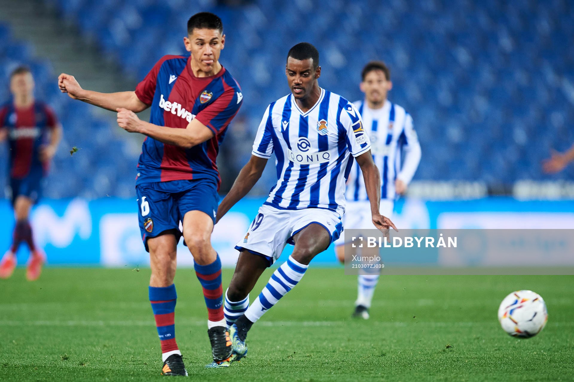 Alexander Isak of Real Sociedad duels for the ball with Oscar Duarte of Levante UD during the La Liga football match between Real Sociedad and Levante on March 7, 2021 in San Sebastian, Spain.
