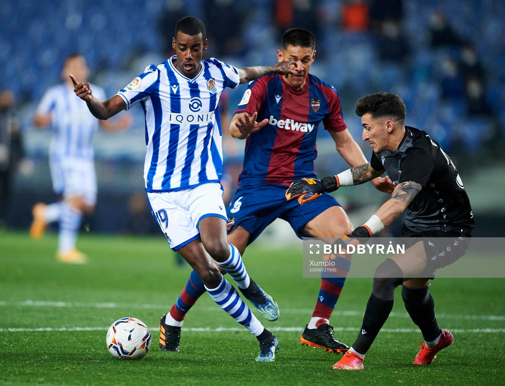 Alexander Isak of Real Sociedad duels for the ball with Oscar Duarte of Levante UD during the La Liga football match between Real Sociedad and Levante on March 7, 2021 in San Sebastian, Spain.