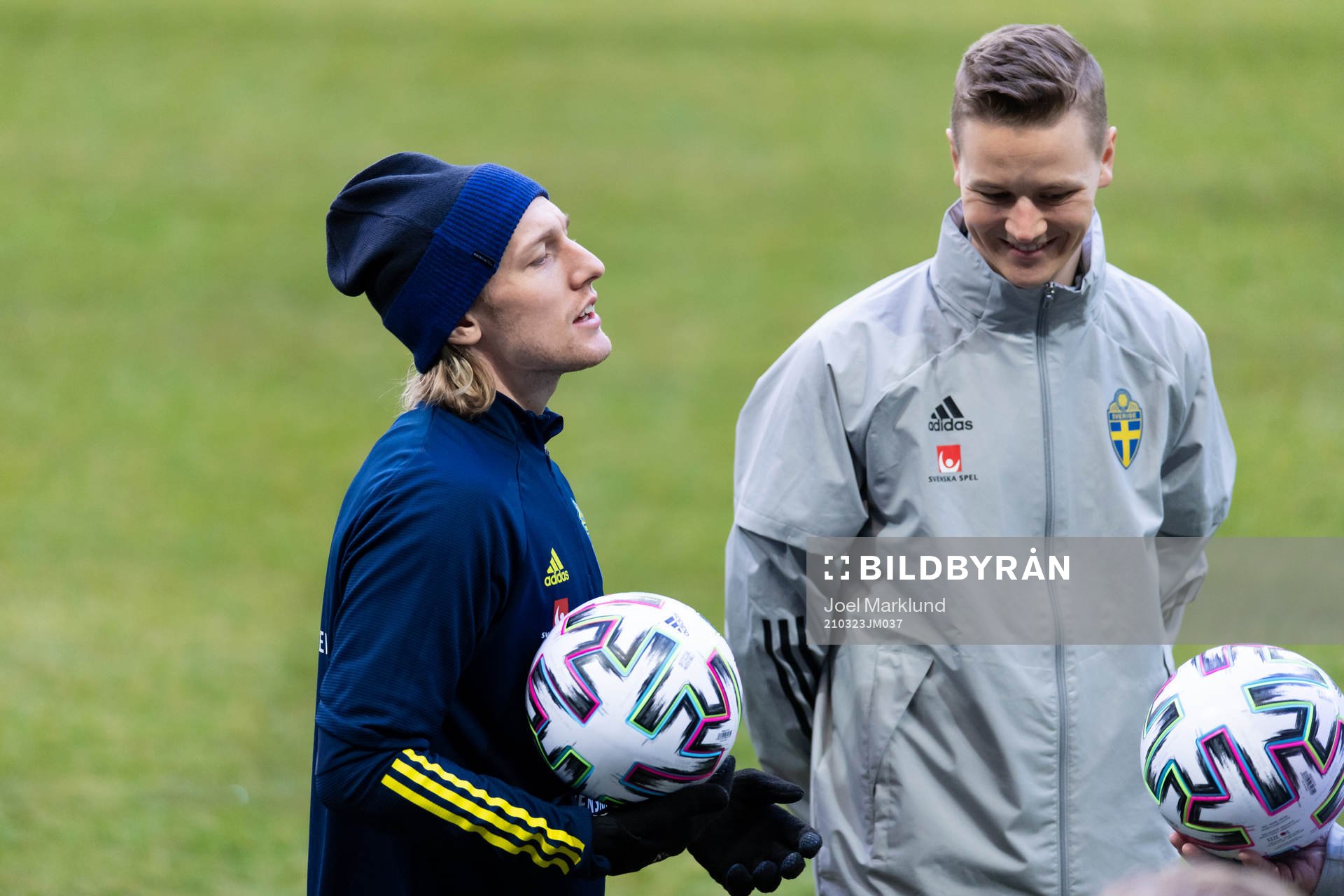 Emil Forsberg and goalkeeper coach Mats Elfvendahl of the