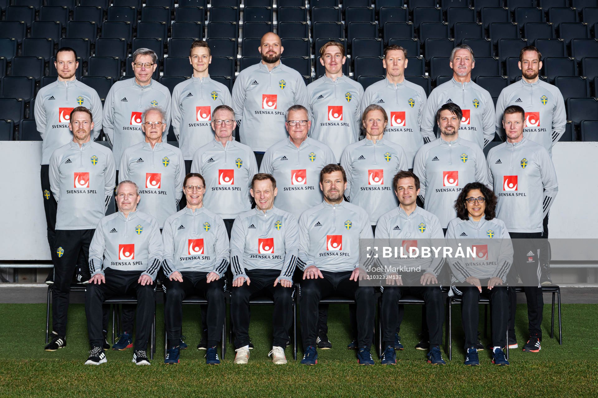 Staff of the Swedish national football team pose for a