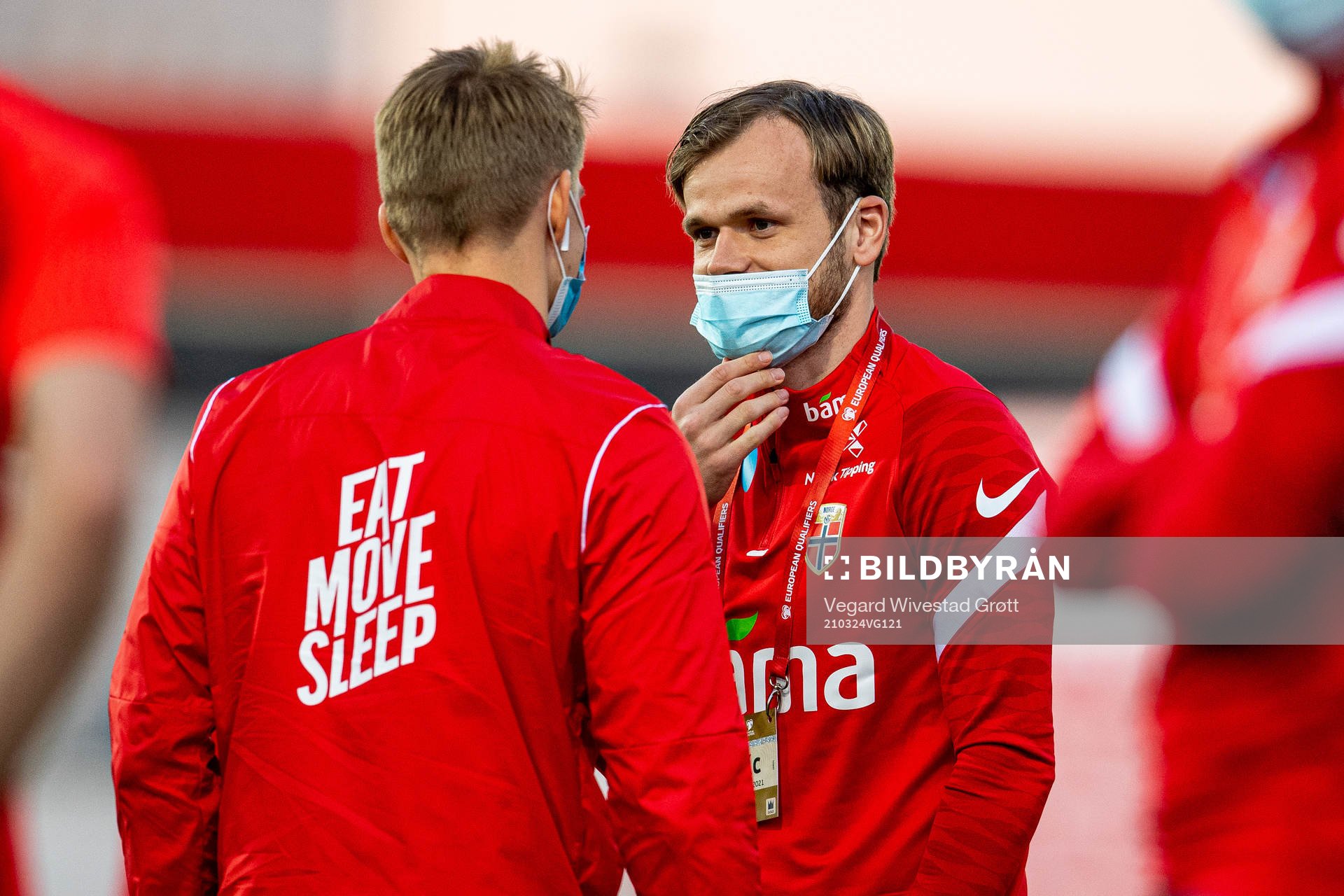 Iver Fossum talks to teammate Martin Ødegaard of Norway