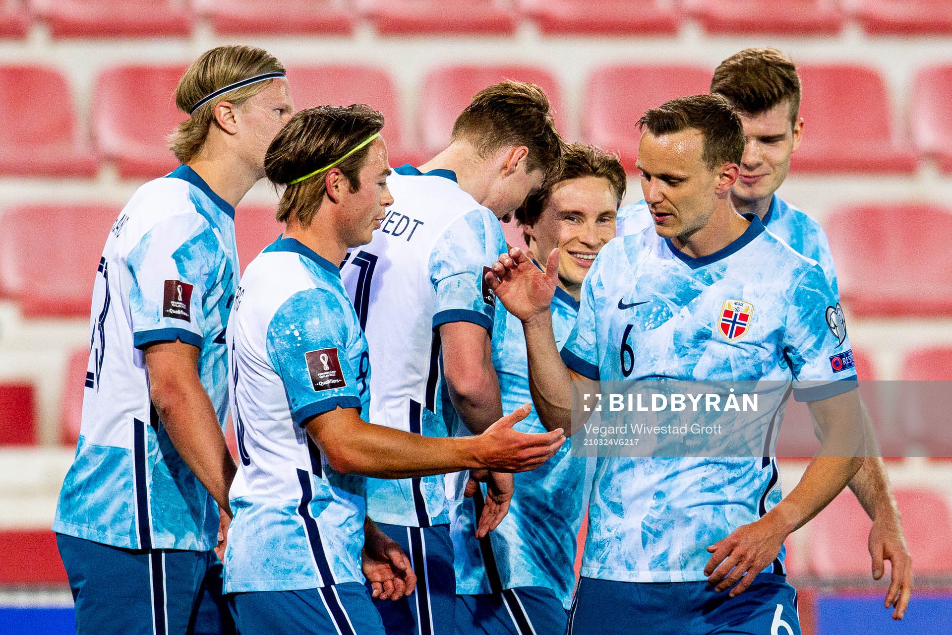 Jonas Svensson of Norway celebrates with teammates Erling