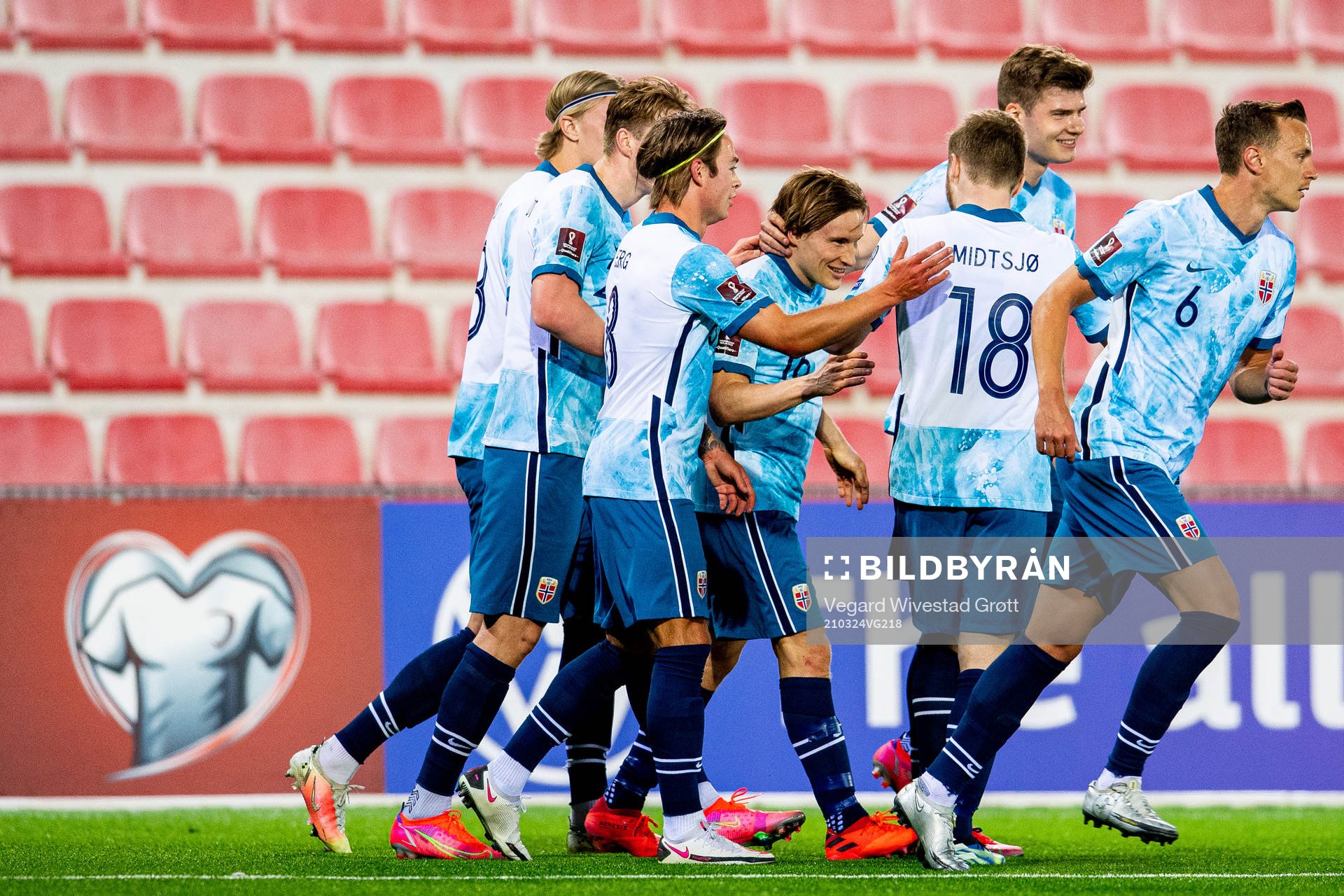 Jonas Svensson of Norway celebrates with teammates Patrick