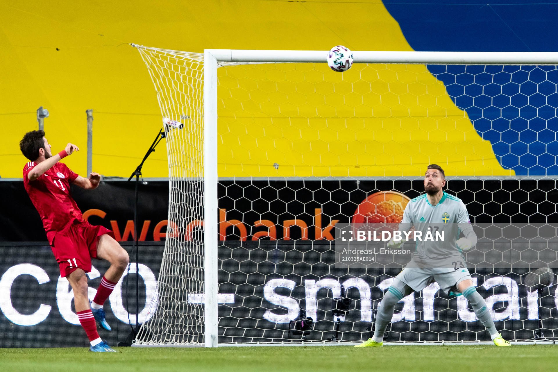 Giorgi Kvilitaia of Georgia and goalkeeper Kristoffer