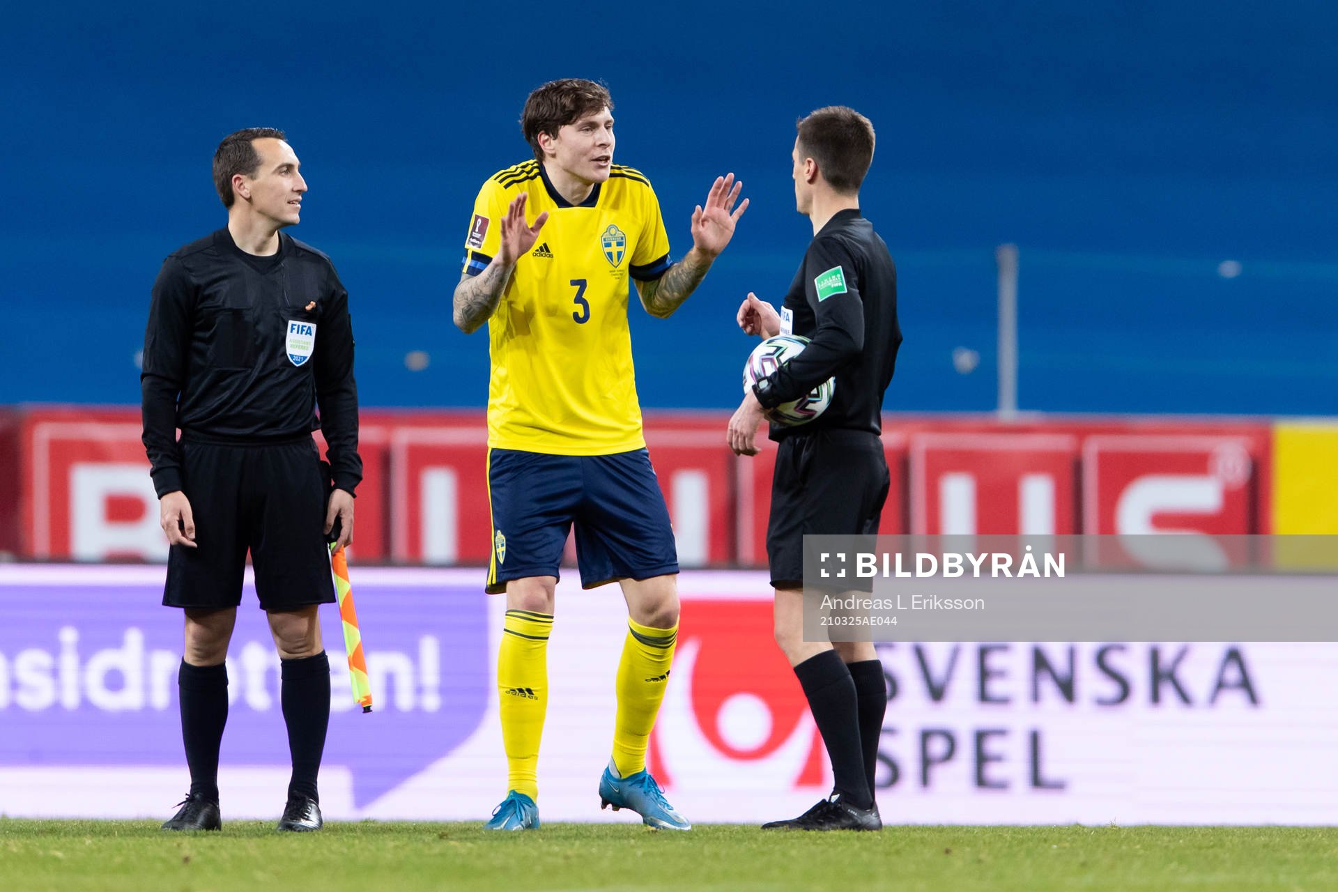 Victor Nilsson Lindelöf of Sweden talks to the referee