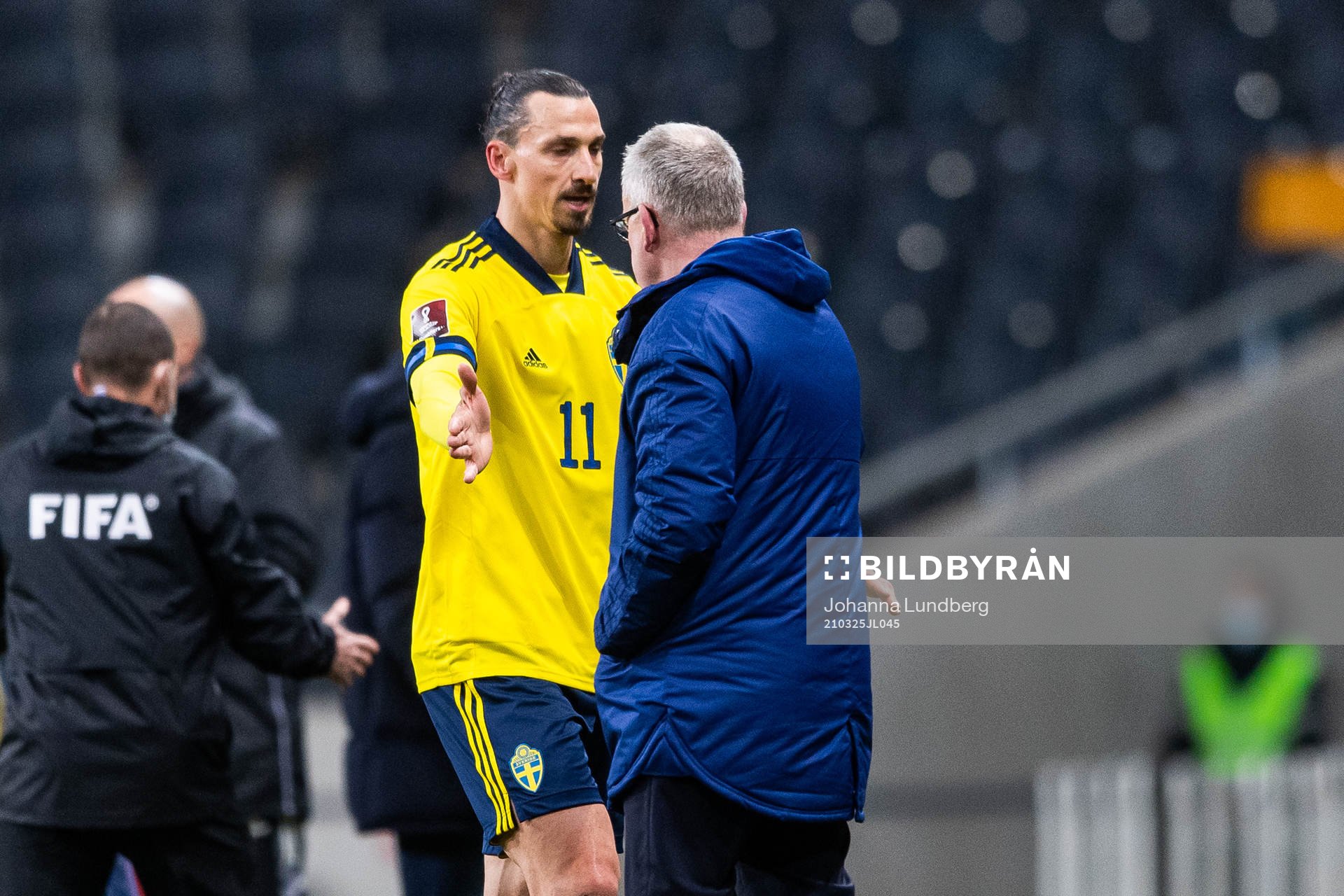 Zlatan Ibrahimovic of Sweden greets Janne Andersson, head