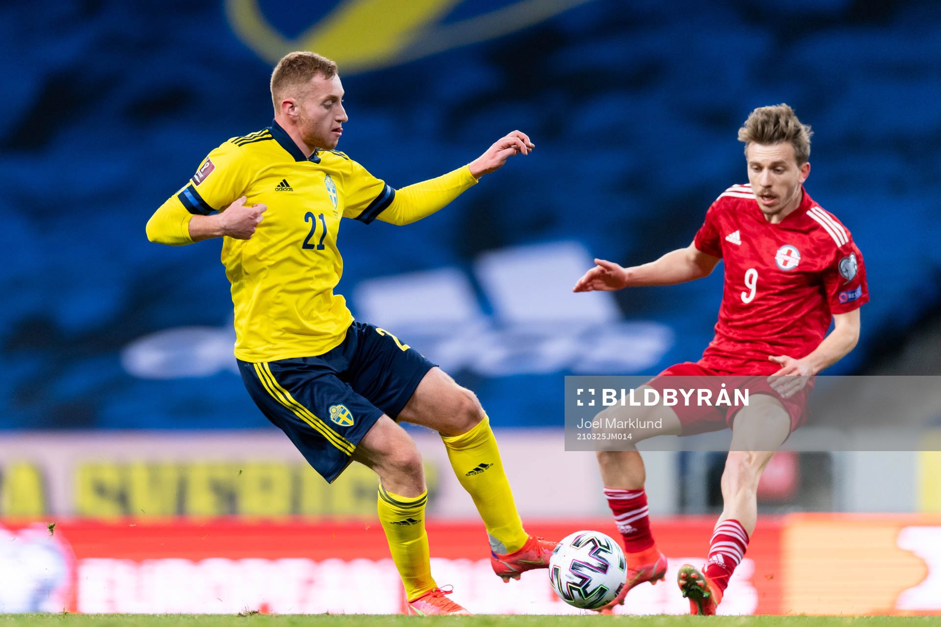 Dejan Kulusevski of Sweden and Saba Lobzhanidze of Georgia
