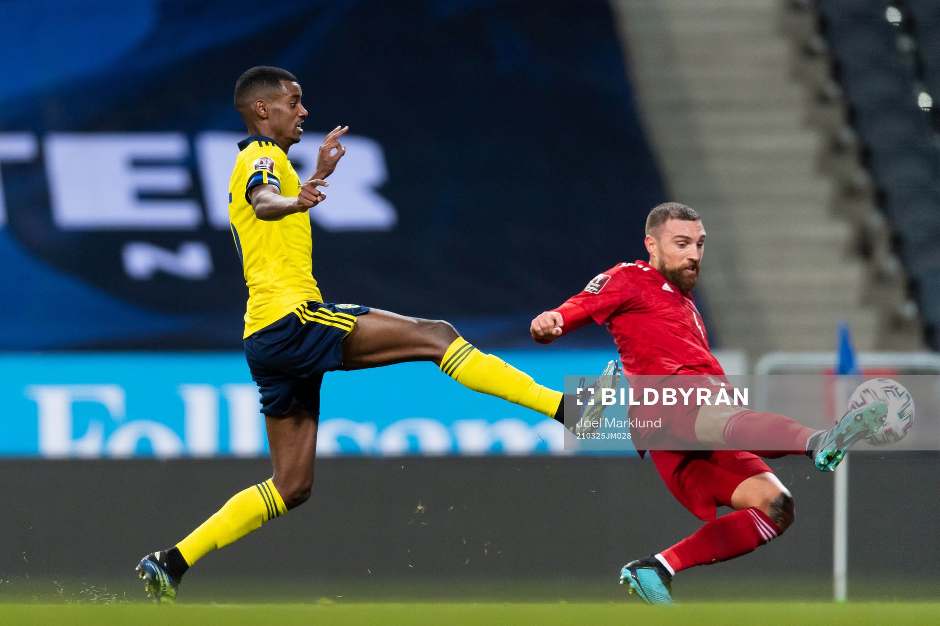 Alexander Isak of Sweden and Guram Kashia of Georgia