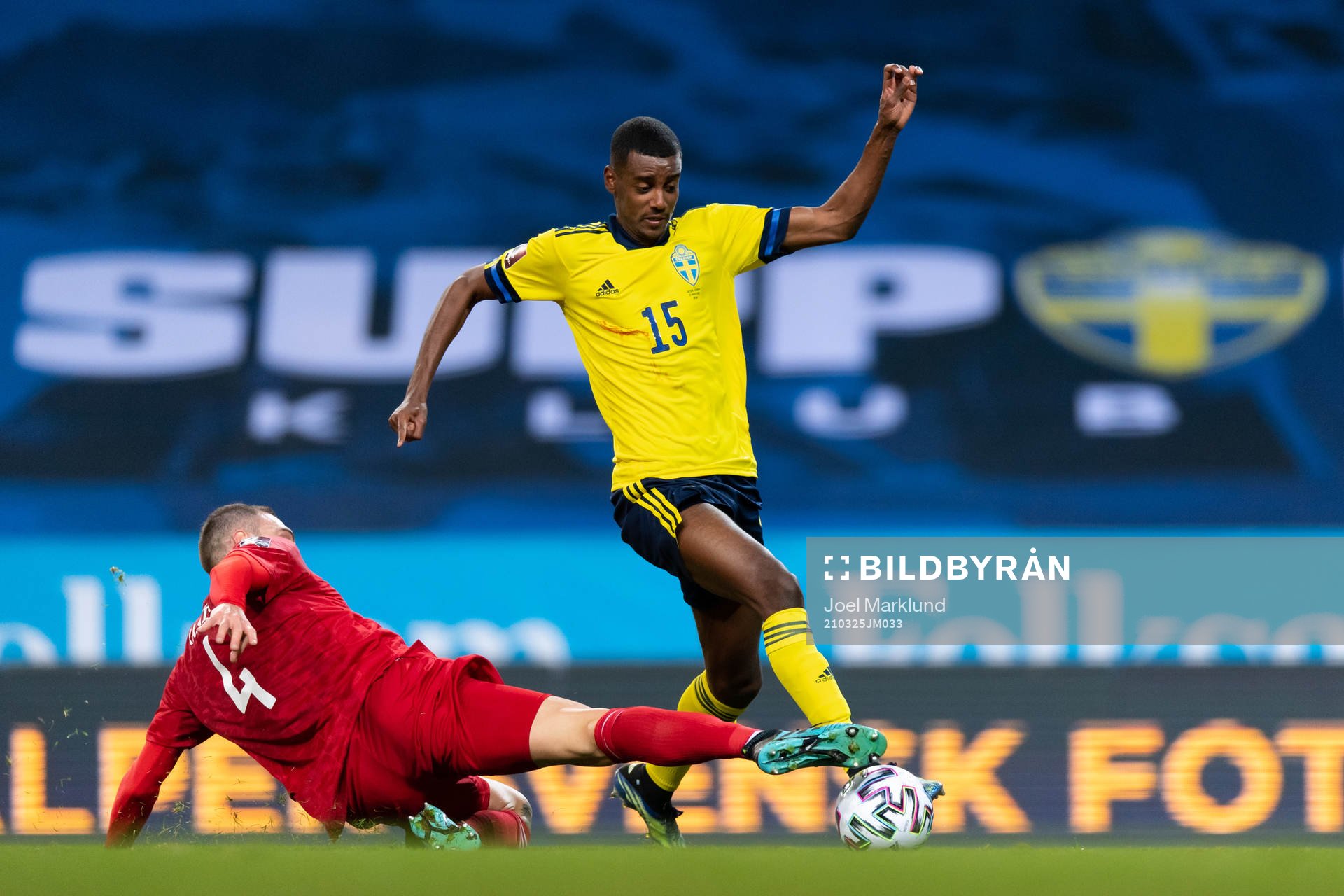 Guram Kashia of Georgia and Alexander Isak of Sweden