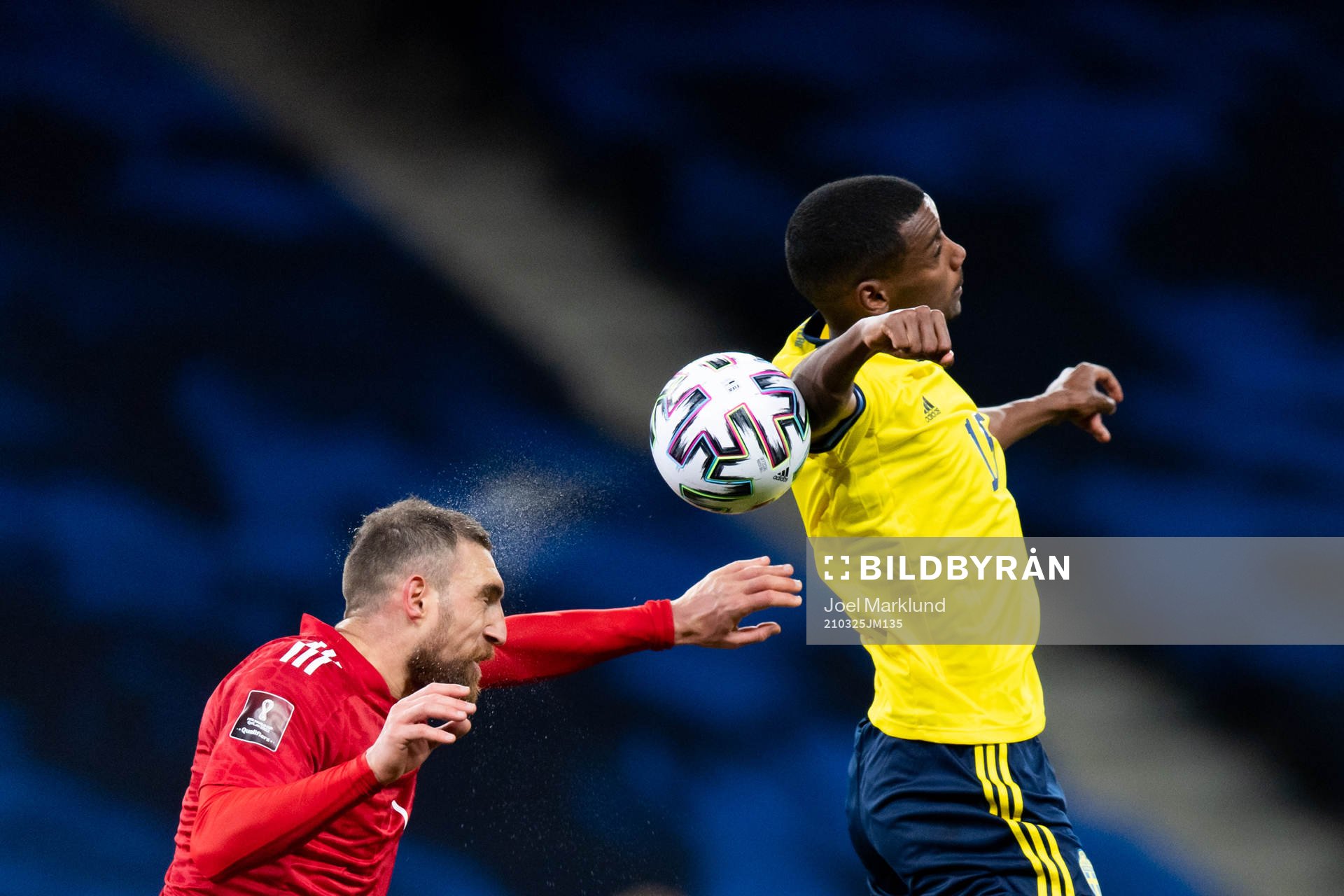 Guram Kashia of Georgia and Alexander Isak of Sweden