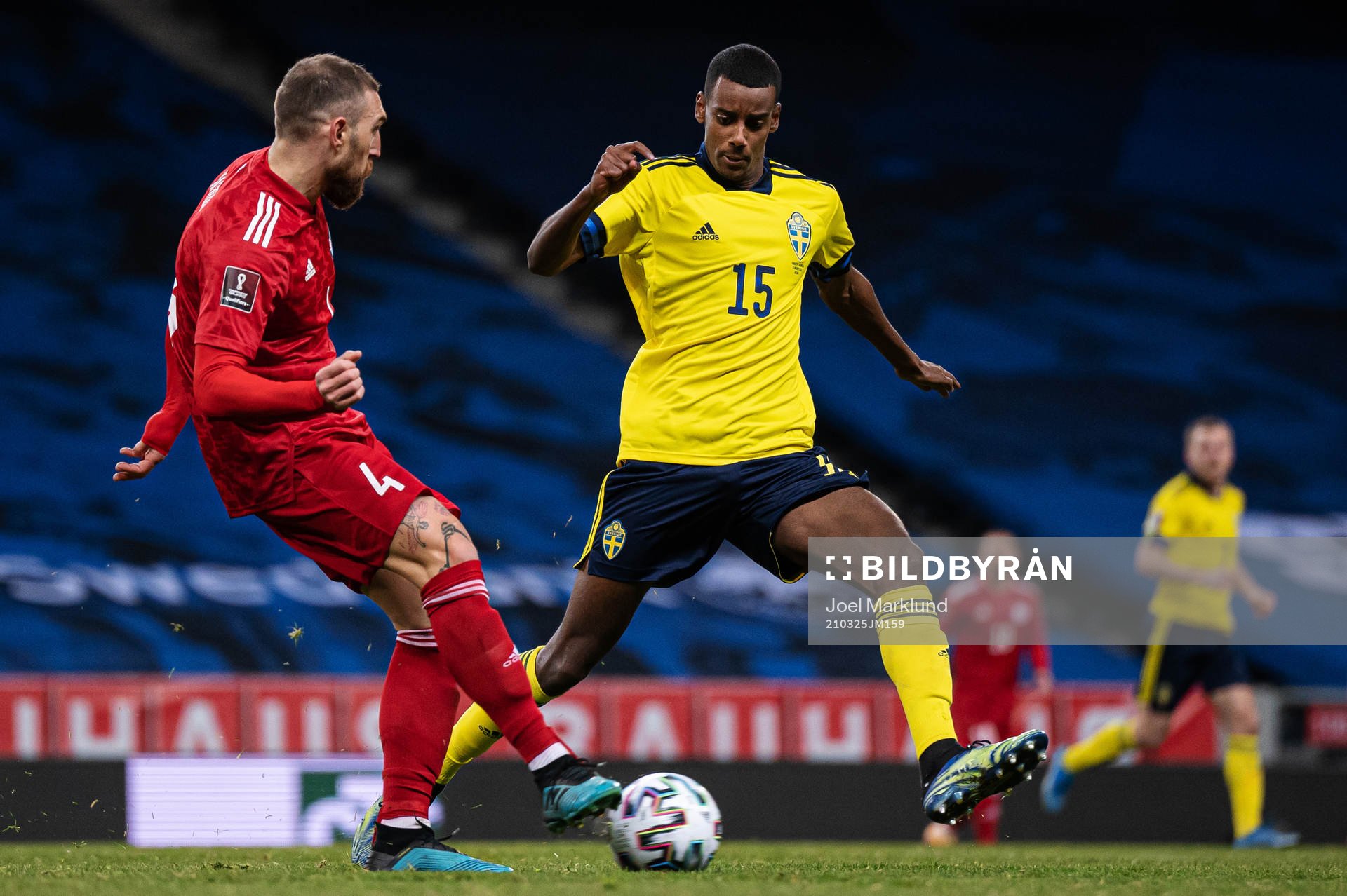 Guram Kashia of Georgia and Alexander Isak of Sweden