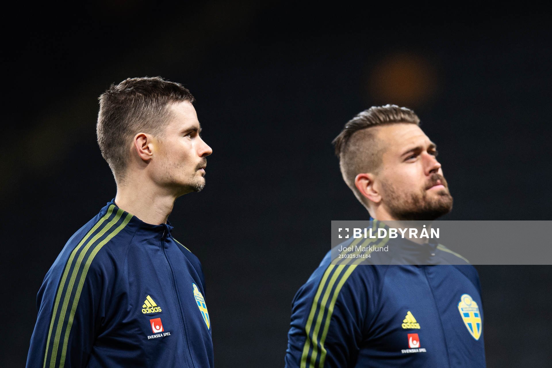 Mikael Lustig and goalkeeper Kristoffer Nordfeldt of Sweden