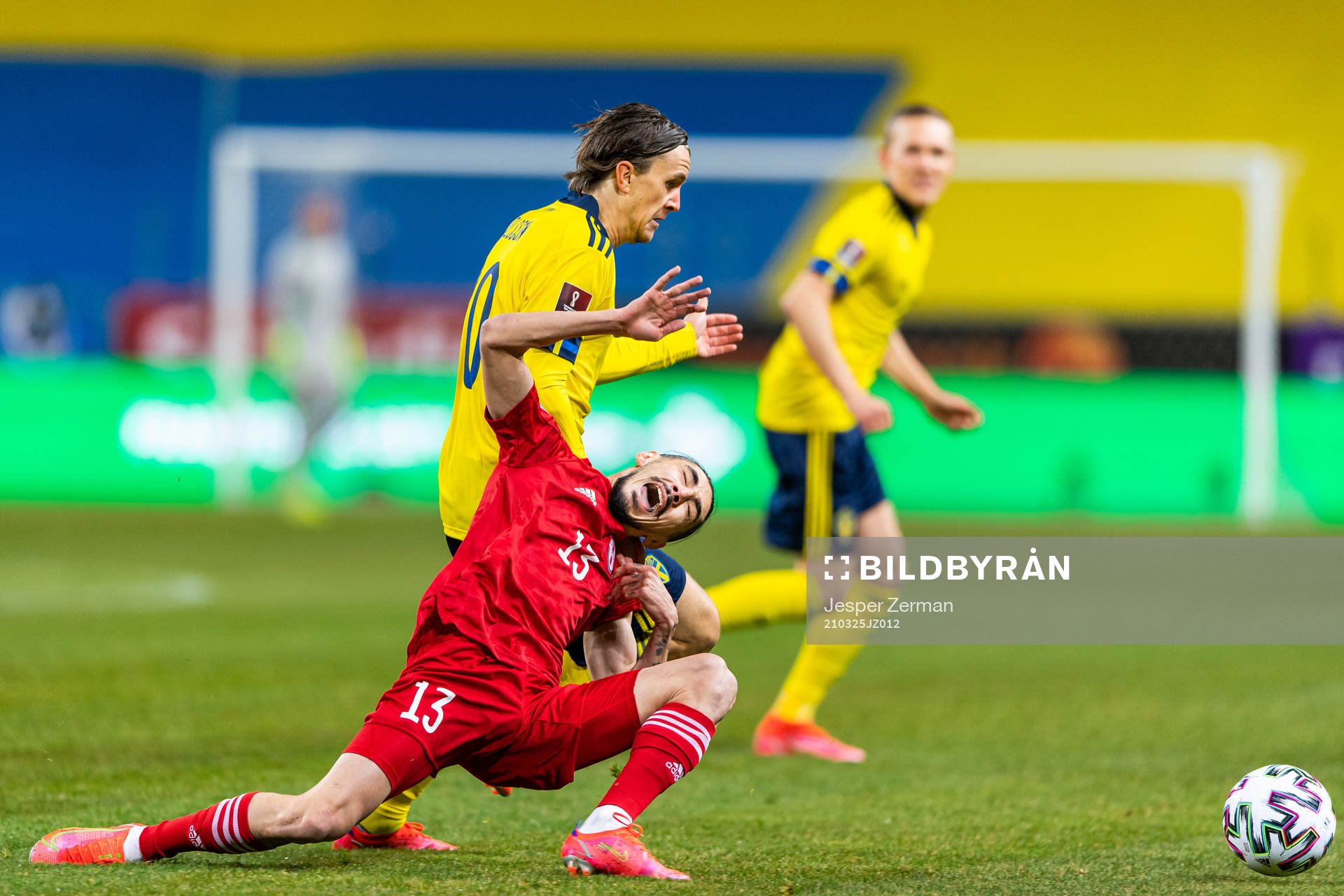 Kristoffer Olsson of Sweden competes for the ball with