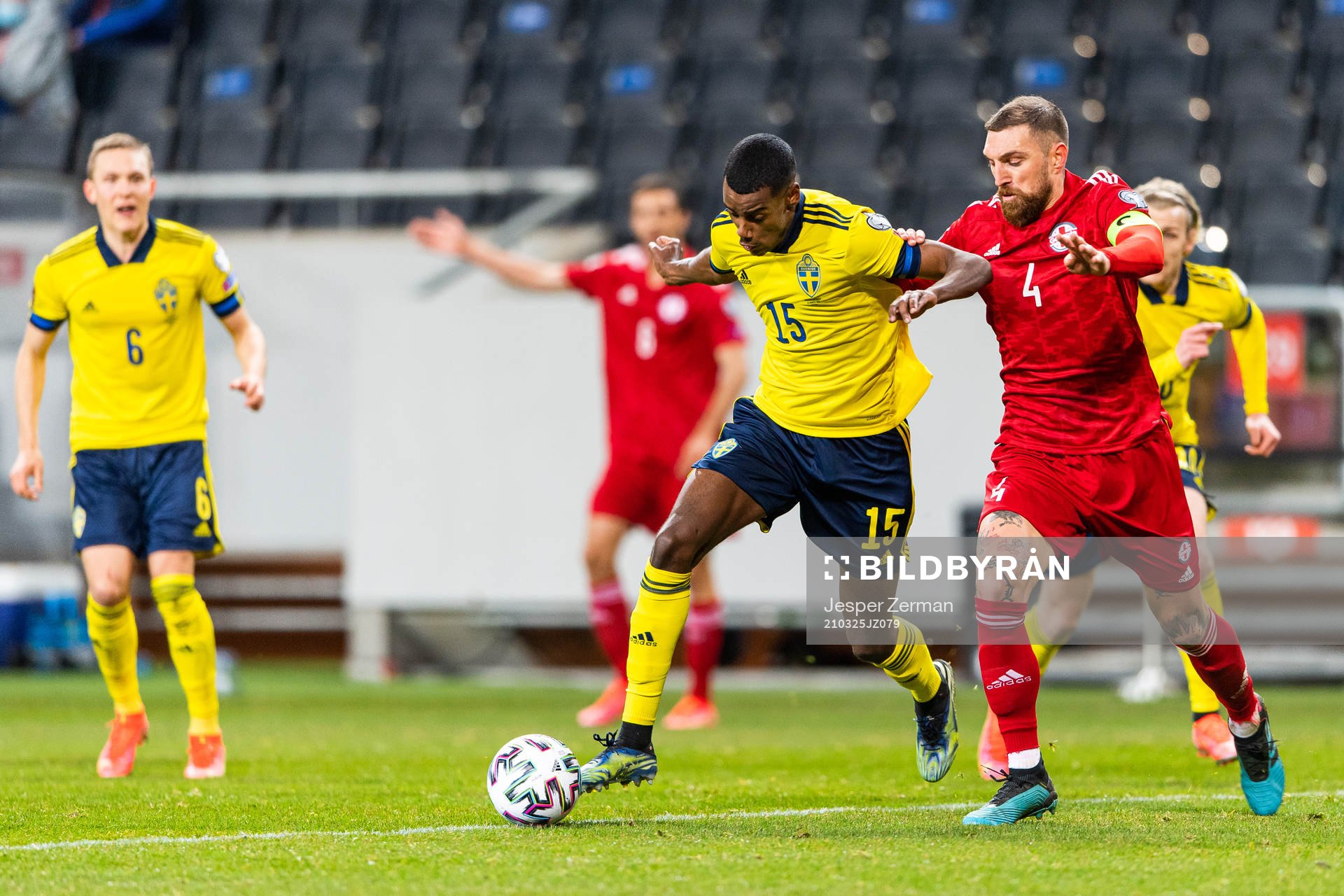 Alexander Isak of Sweden and Guram Kashia of Georgia