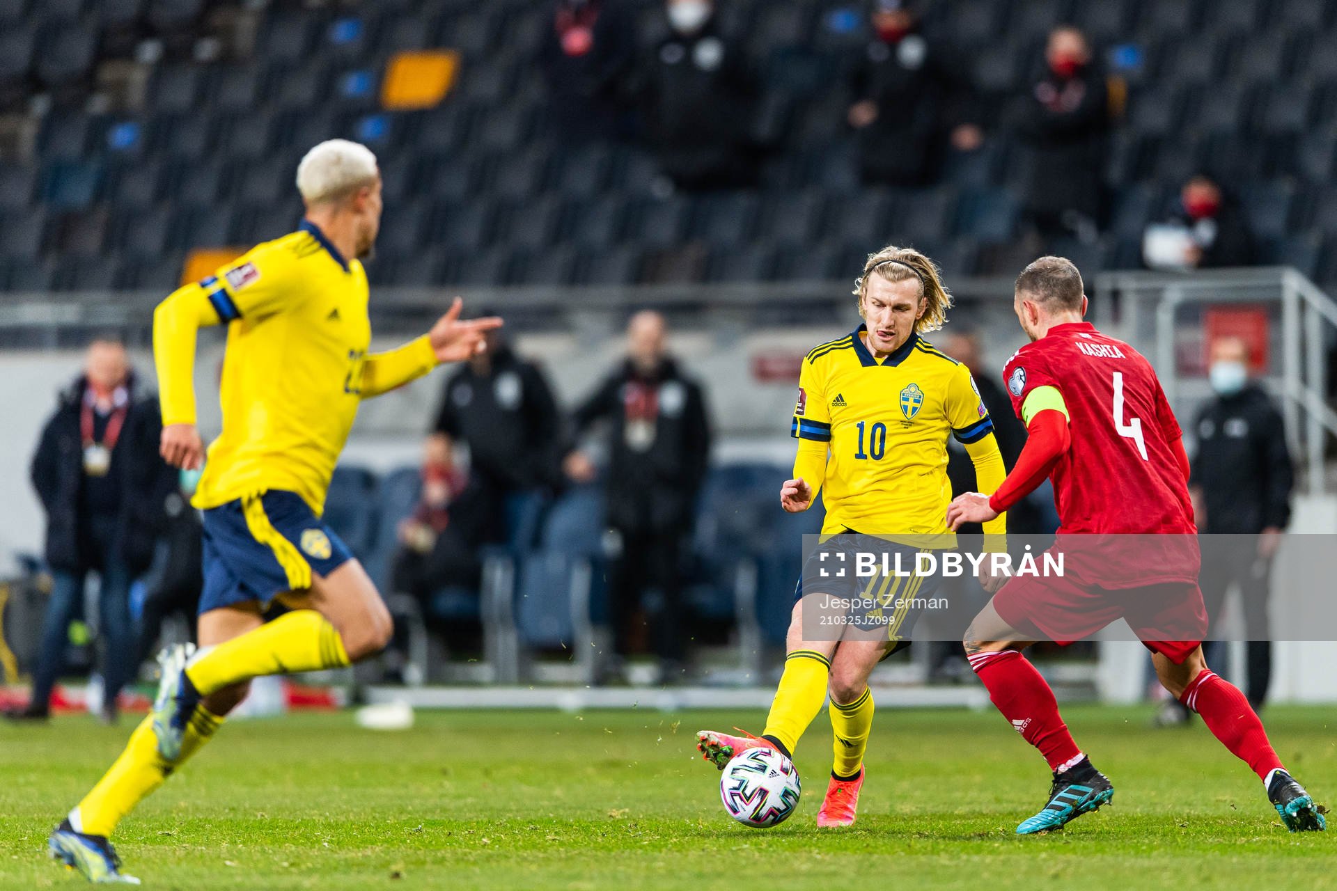 Emil Forsberg of Sweden and Guram Kashia of Georgia