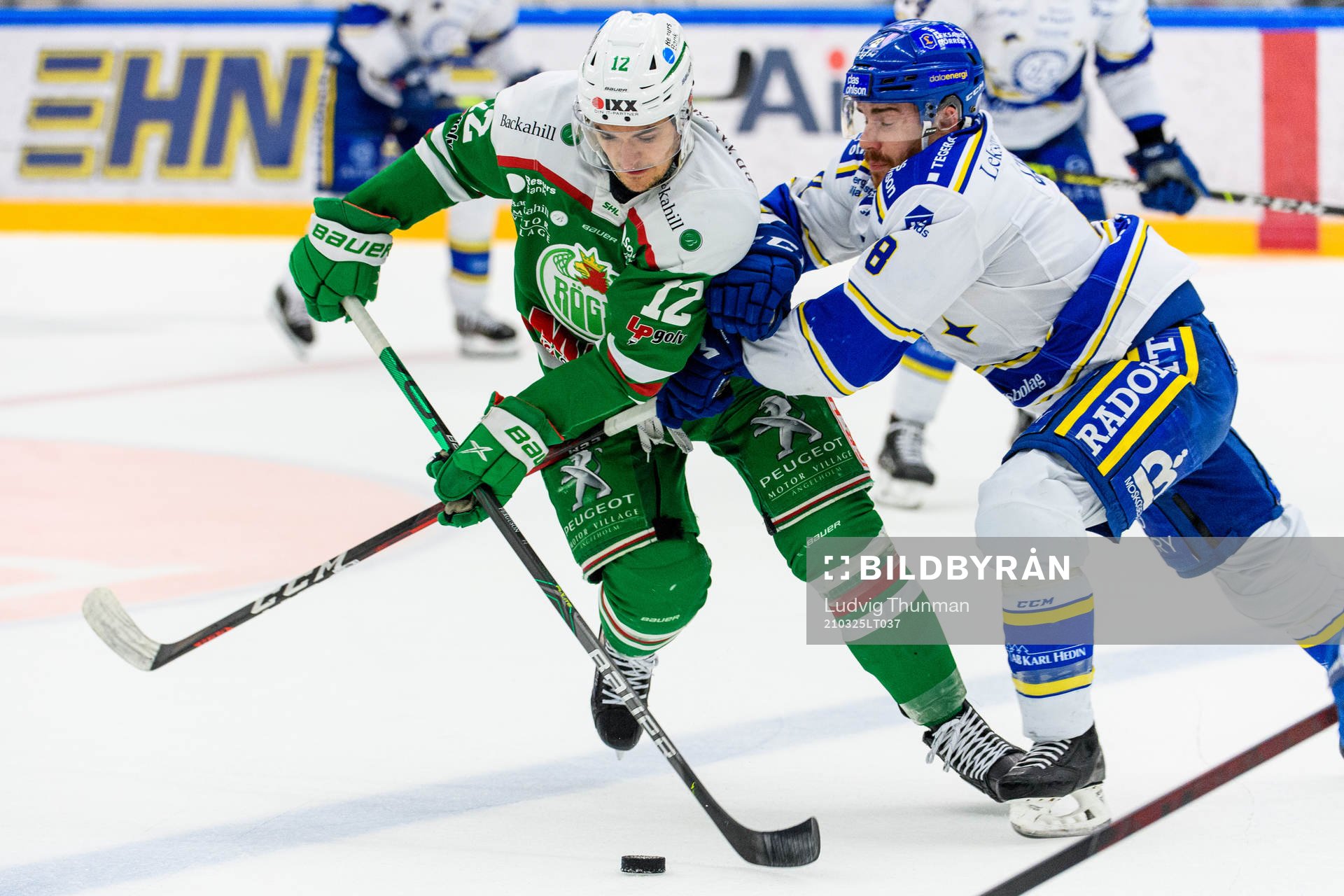 Rögles Brady Ferguson och Leksands Matt Caito