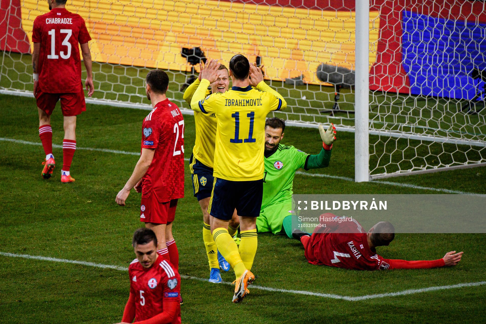 Viktor Claesson and Zlatan Ibrahimovic of Sweden celebrate