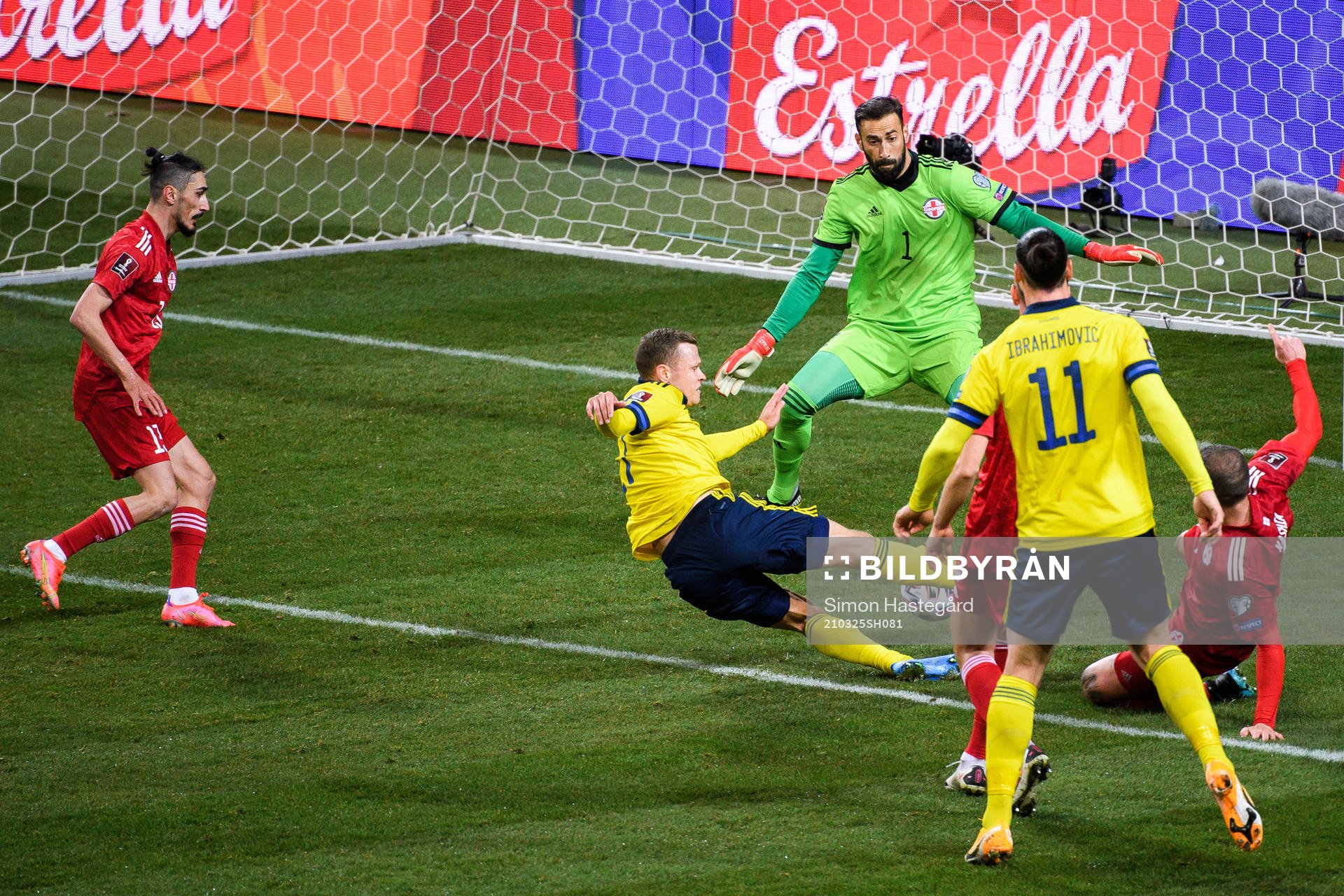 Viktor Claesson of Sweden scores the 1-0 goal behind