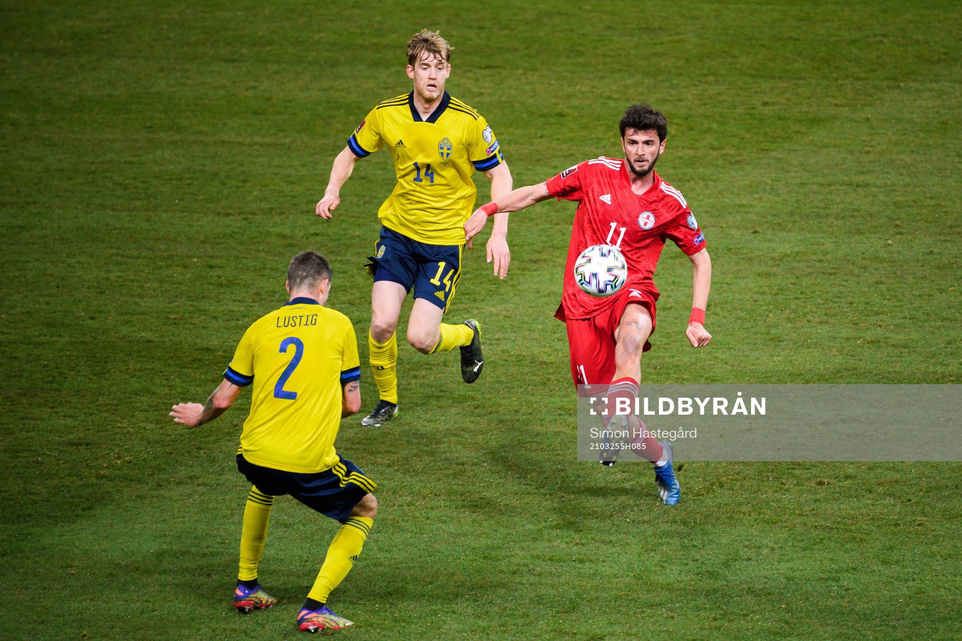 Mikael Lustig and Filip Helander of Sweden against Giorgi
