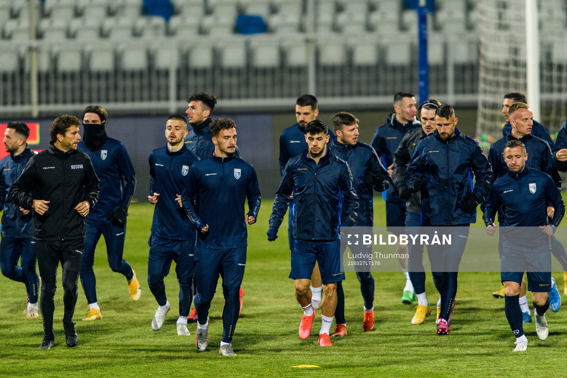 Players of the Kosovo national football team warm up