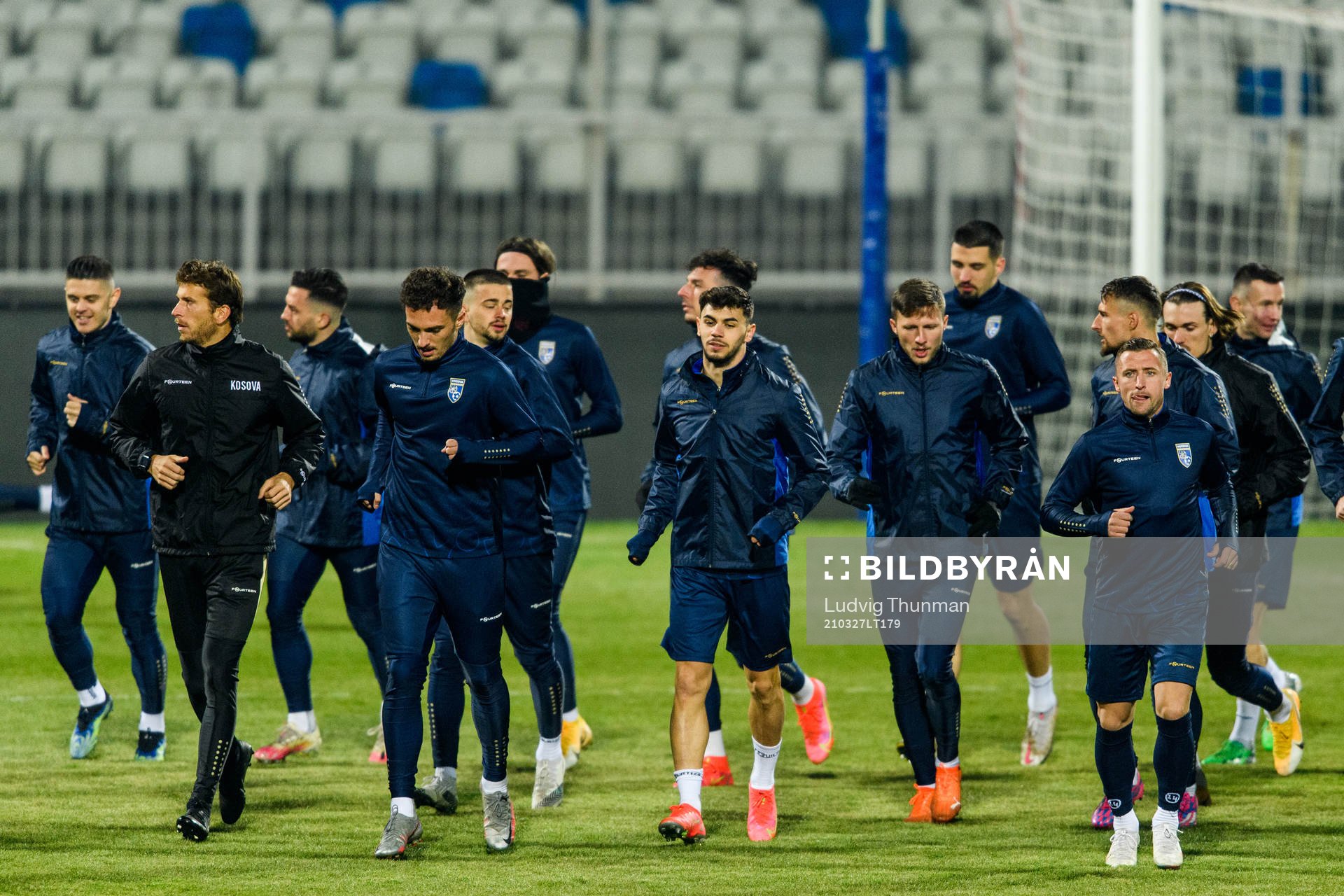 Players of the Kosovo national football team warm up