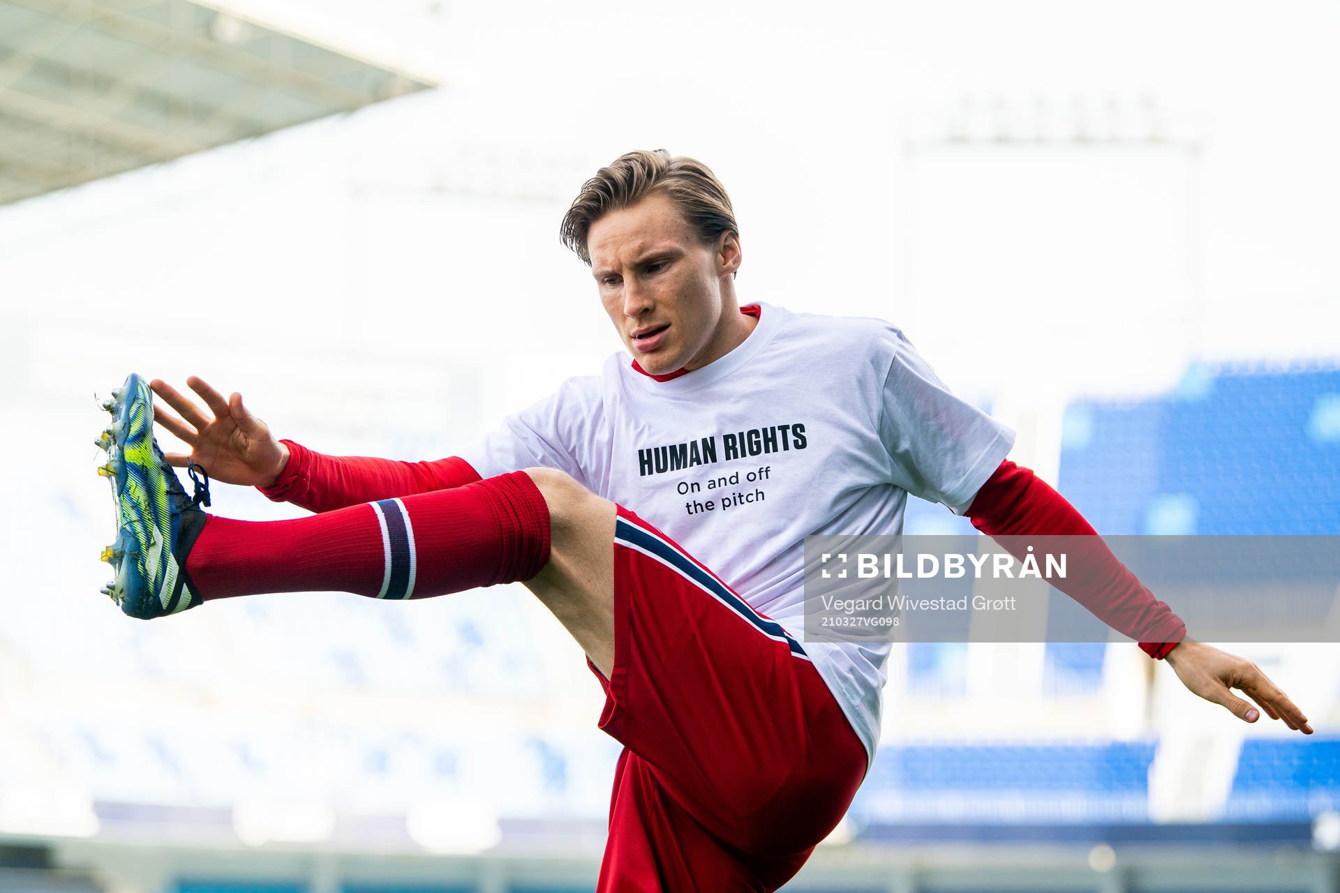 Jonas Svensson of Norway warms up wearing a t-shirt with