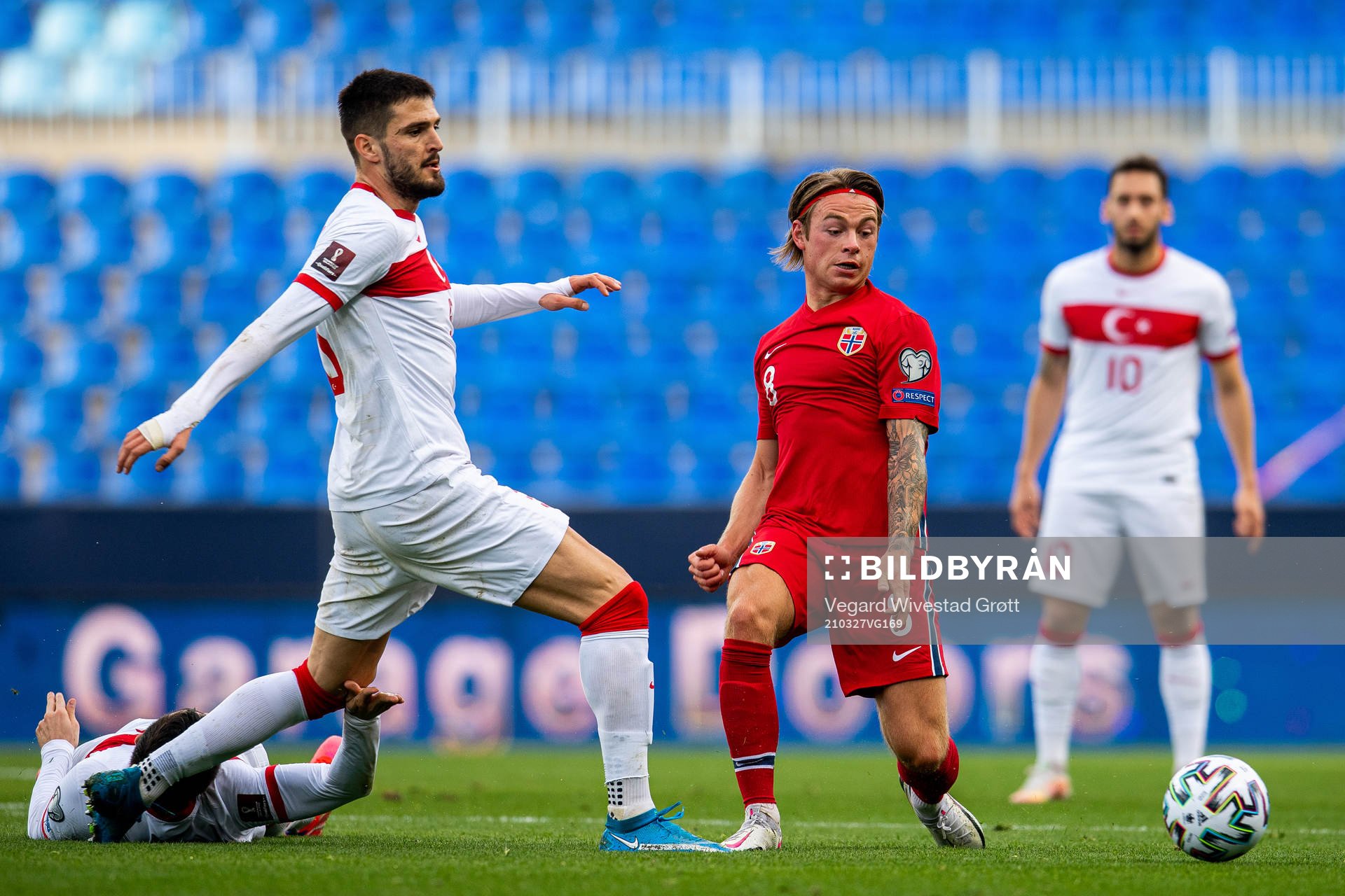 Okay Yokuslu of Turkey and Patrick Berg of Norway during the FIFA World Cup Qualifier football match between Norway and Turkey on March 27, 2021 in Malaga.