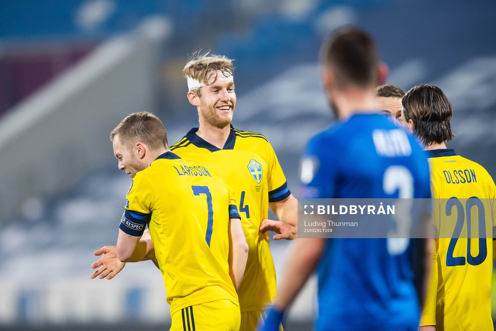 Sebastian Larsson and Filip Helander of Sweden celebrate