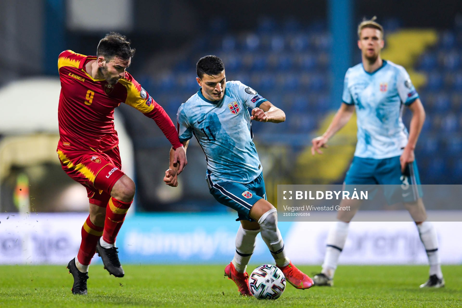 Dino Islamovic of Montenegro and Mohamed Elyounoussi of Norway during the FIFA World Cup Qualifier football match between Montenegro and Norway on March 30, 2021 in Podgorica.