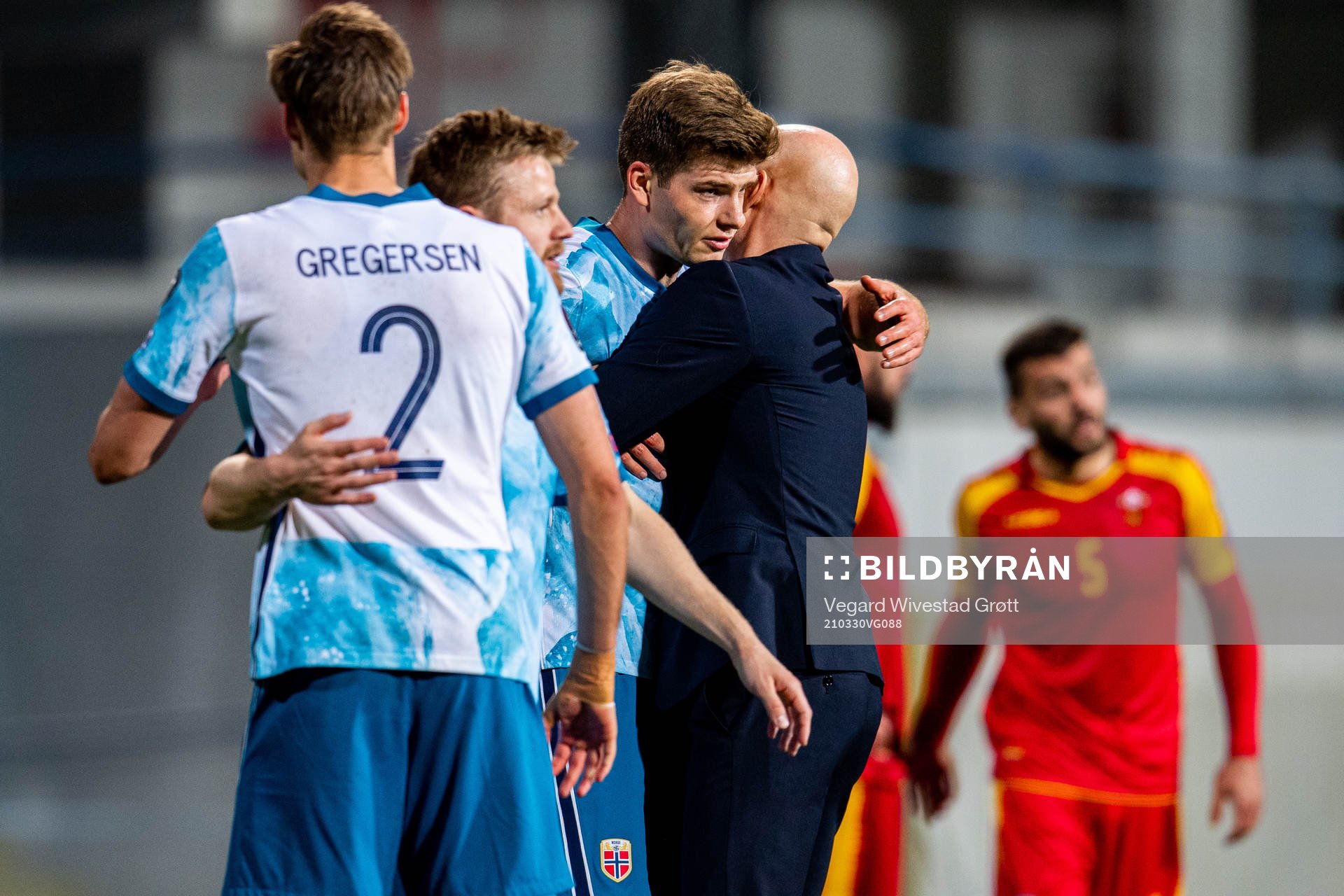 Alexander Sørloth and Ståle Solbakken, head coach of Norway, celebrate after the FIFA World Cup Qualifier football match between Montenegro and Norway on March 30, 2021 in Podgorica.