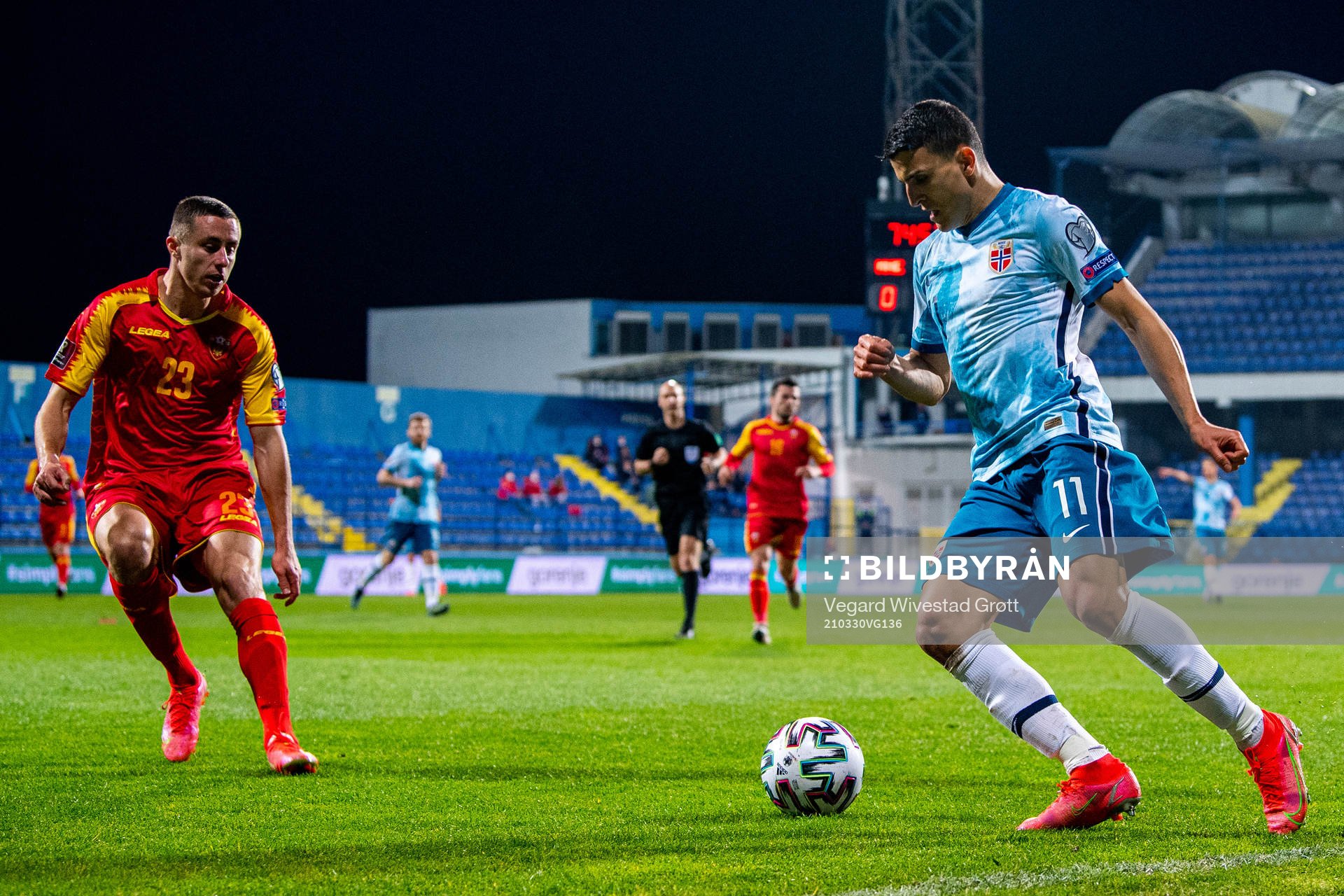 Adam Marusic of Montenegro and Mohamed Elyounoussi of Norway