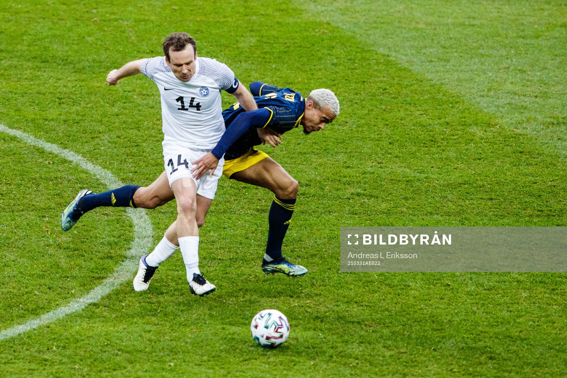 Konstantin Vassiljev of Estonia and Robin Quaison of Sweden